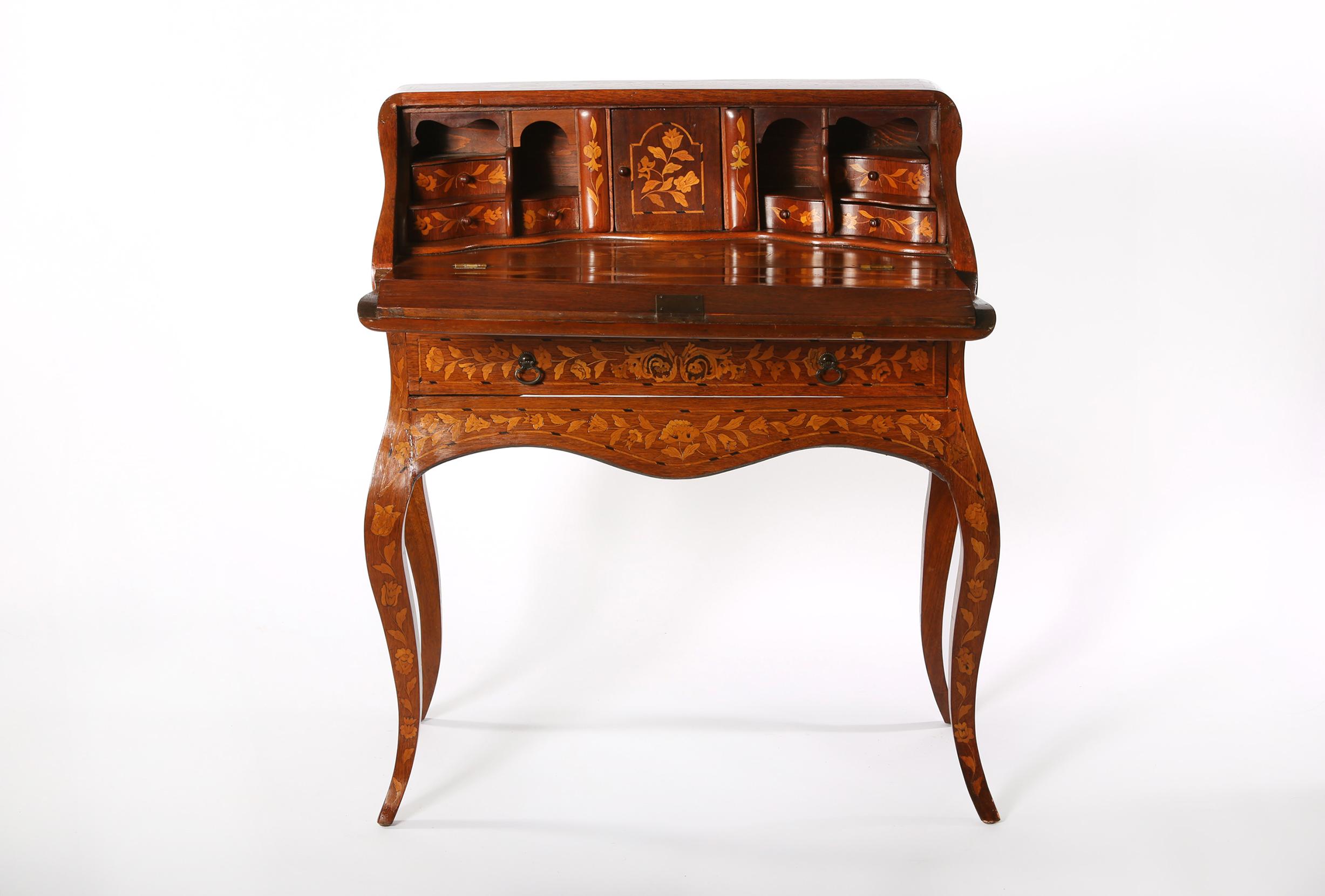 Early 19th century Dutch marquetry slant desk with front drawer. The desk is in good antique condition with wear appropriate to age / use. The desk stand on nicely done cabriole legs and measure about 41 inches high x 36 inches wide x 18.5 inches