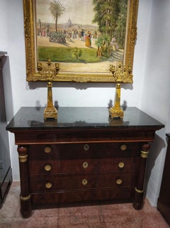 Early 19th Century Empire Flame Mahogany and Black Marble French Chest of Drawer