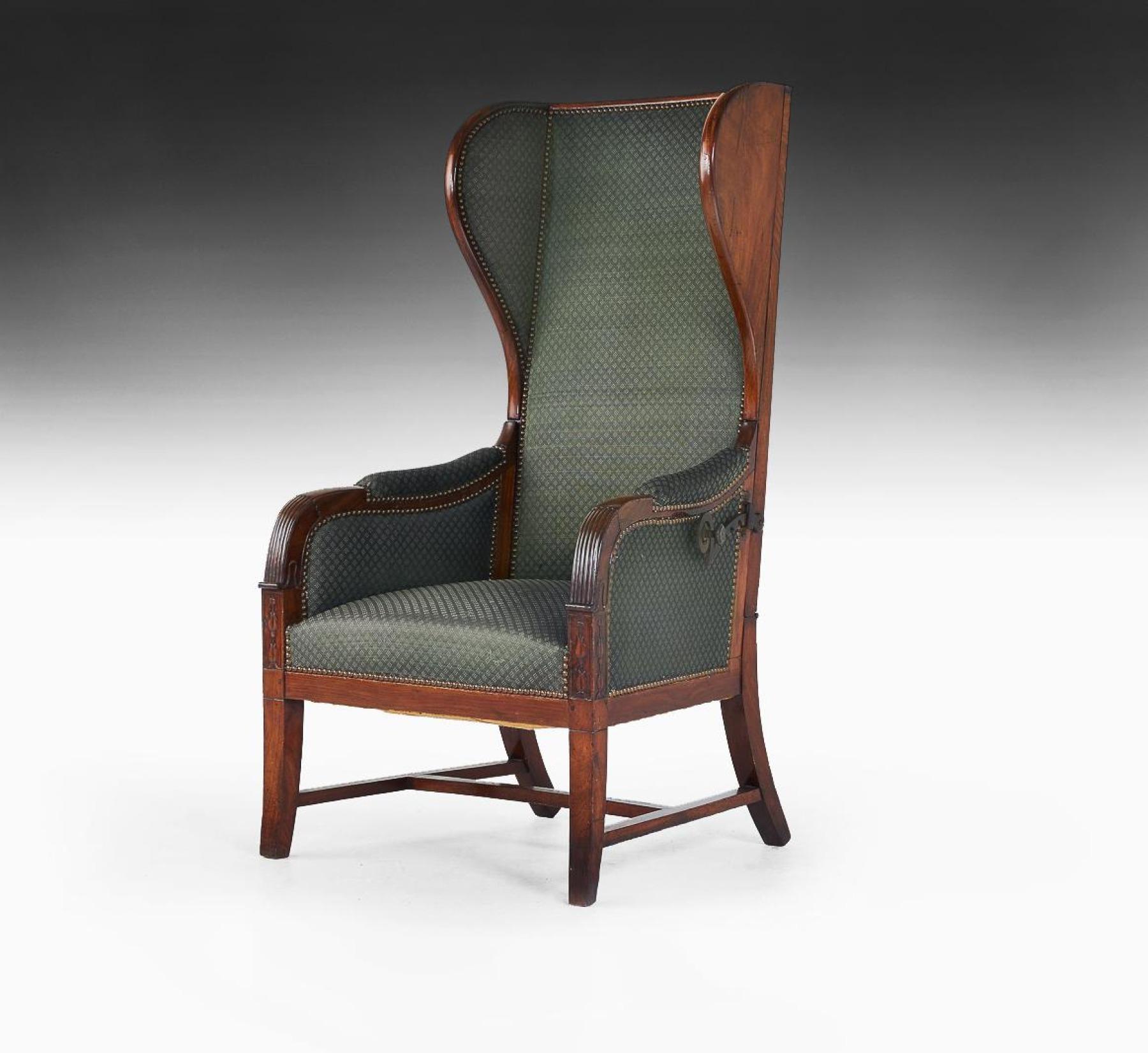 An unusual French mahogany reclining wing back armchair of high proportions, late Empire.

French, circa 1820.

 
Of elegant proportions, having an unusually high reclining winged mahogany back. The stuff-over seat between padded armrest with