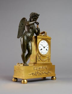 Pendule de cheminée Empire du début du XIXe siècle par Ledure avec Apollo ou Eros