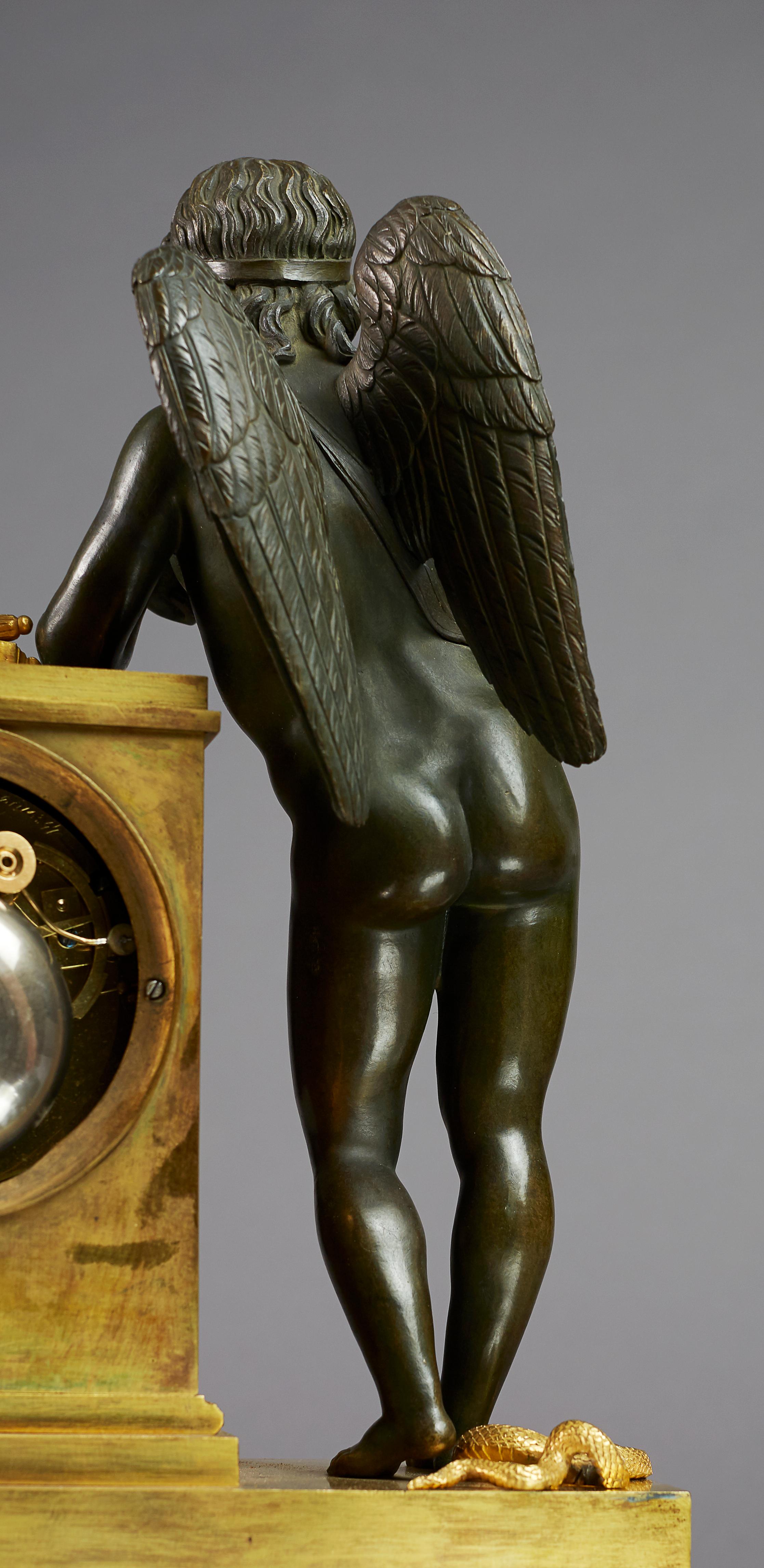 Français Pendule de cheminée Empire du début du XIXe siècle par Ledure avec Apollon ou Eros en vente