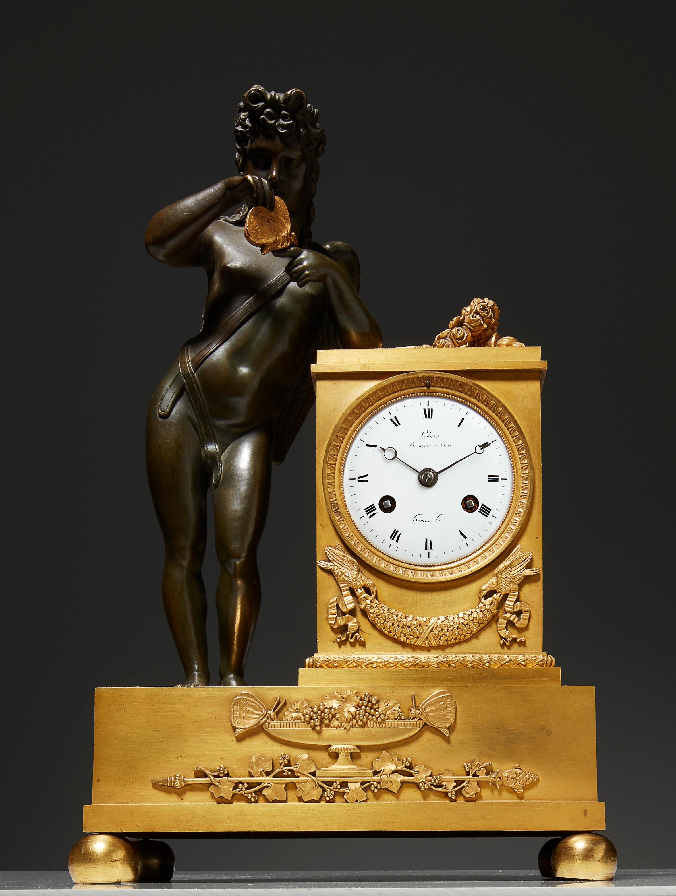 French Early 19th Century Empire Mantel Clock by Ledure with Apollo or Eros For Sale