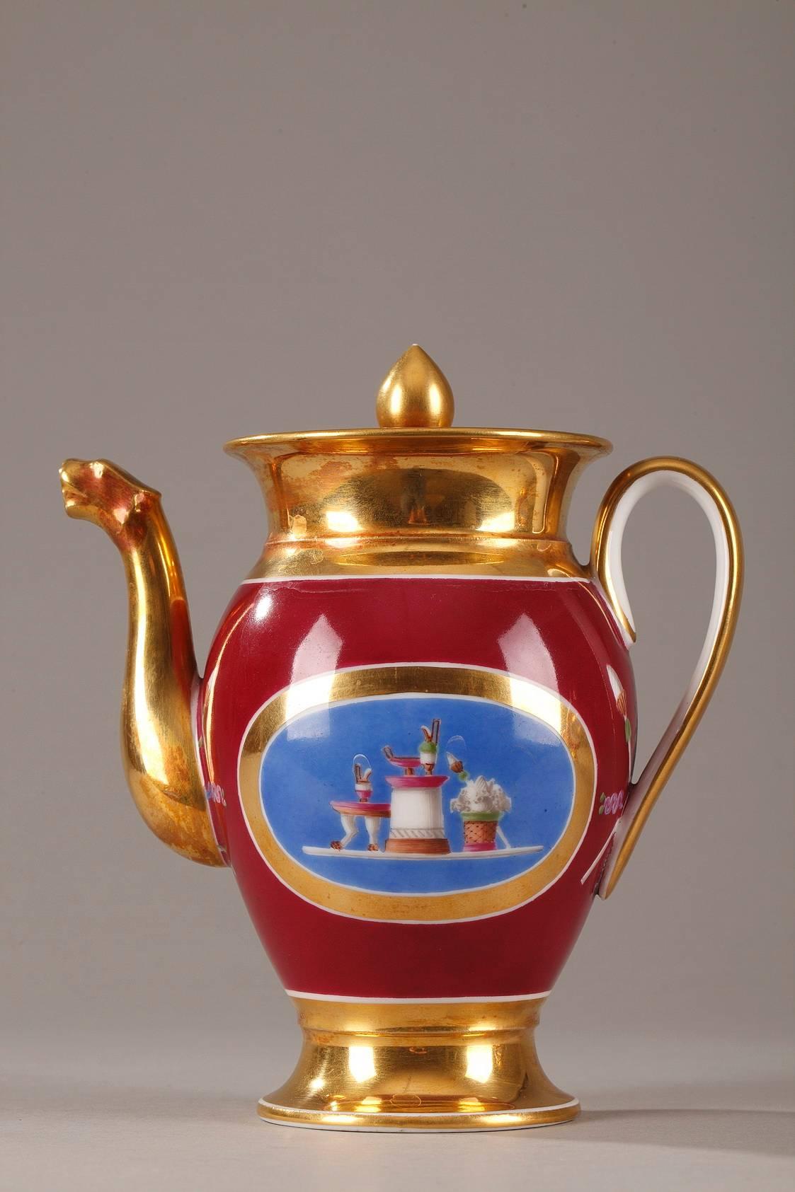 Empire porcelain set composed of a coffee pot and a pitcher for hot milk. They are decorated with medallions featuring musical and revolutionary motifs. Gold trim surrounds the medallions, which are set in a wine red, lie de vin background,

