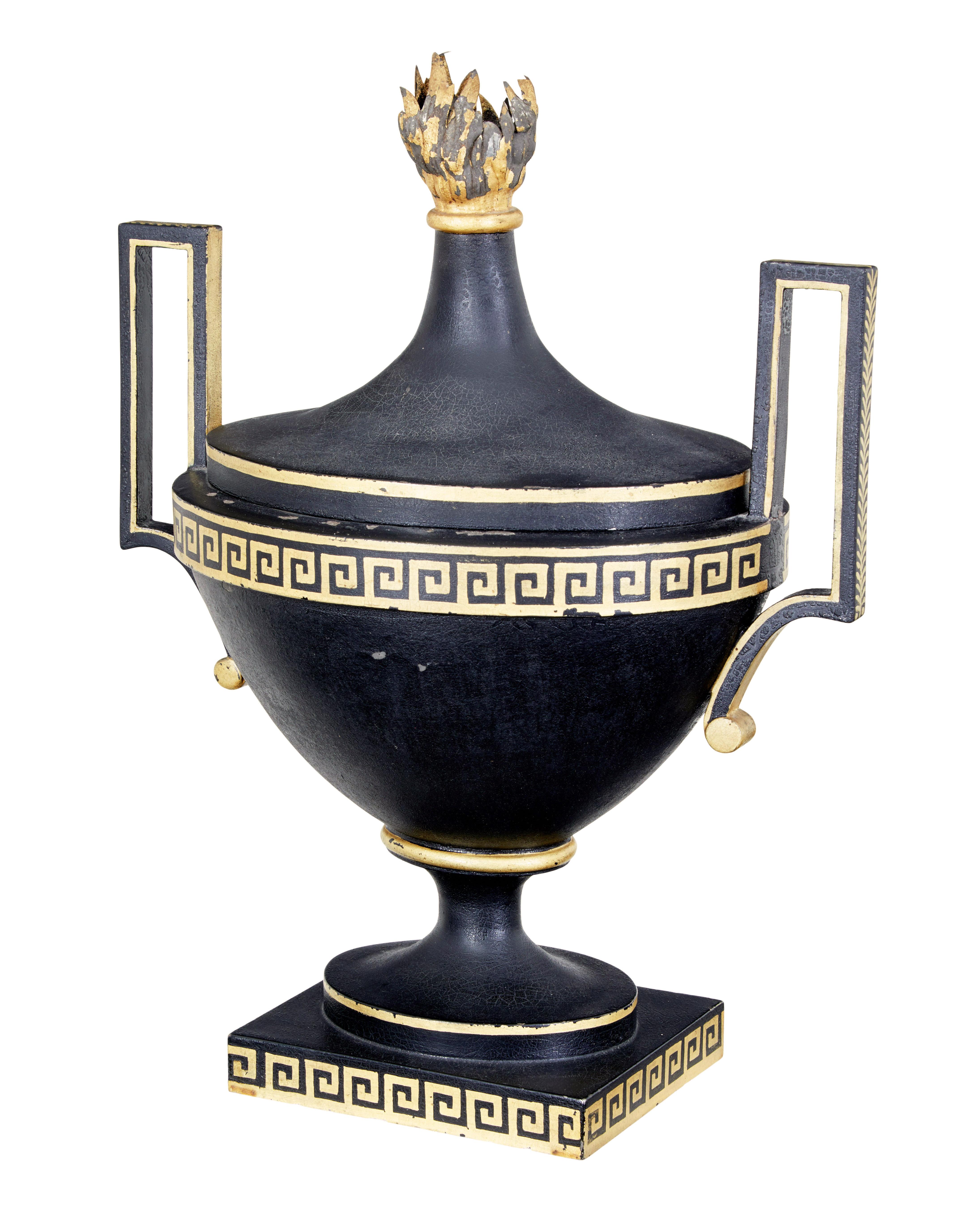 Early 19th century empire toleware decorative urn circa 1830.

Rare decorative urn that would have been used for incense or pot pourri. Original black paint with very strong grecian influences with the gilt painted greek key and embellishments. 