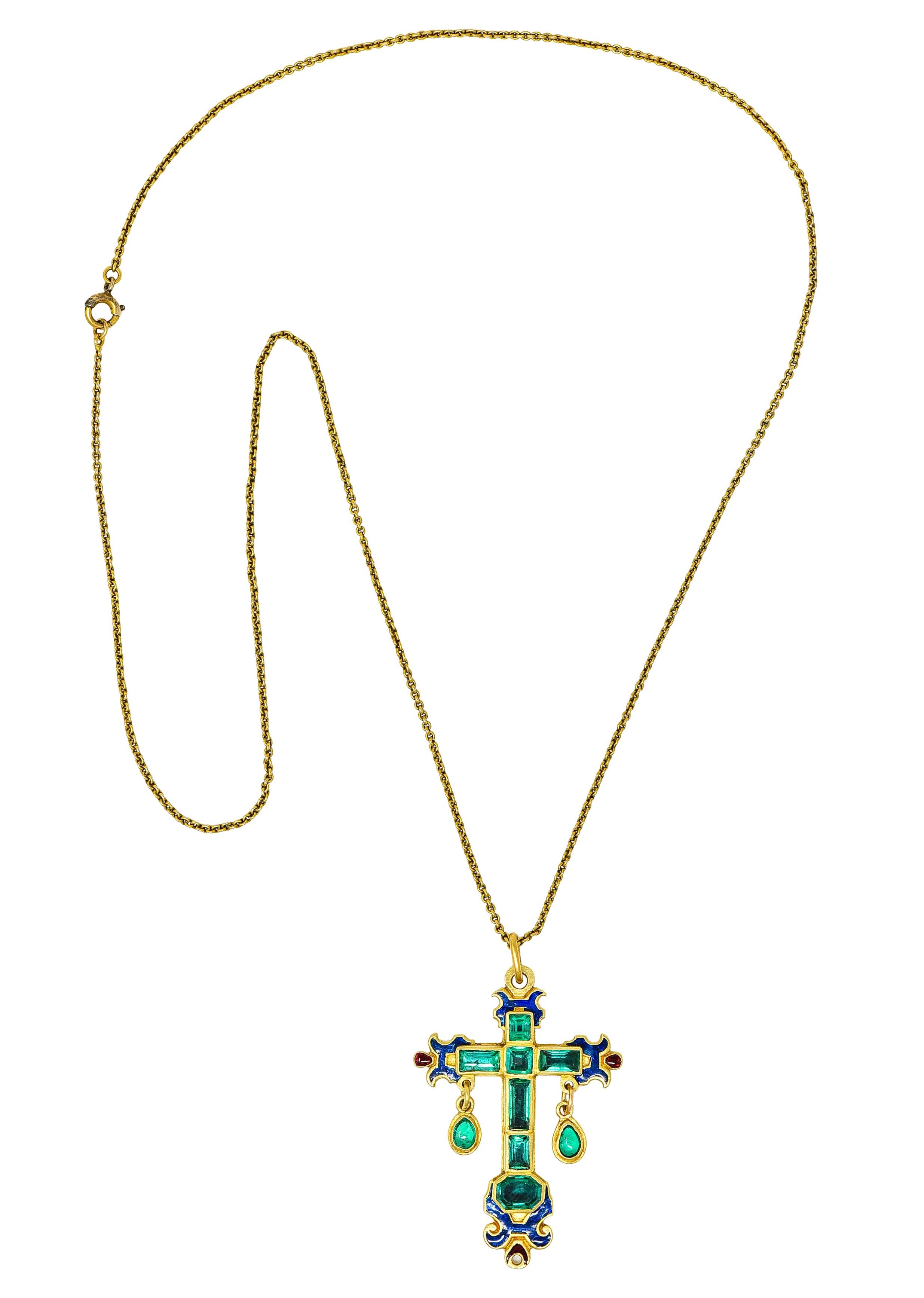 Cable chain necklace suspends a substantial cross shaped pendant accented by articulated drops

Set with emerald cut, cabochon cut, octagonal cut and square cut emeralds

Weighing collectively approximately 2.80 carats - well matched in slightly