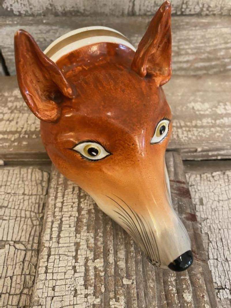 Early 19th century English ceramic fox stirrup cup
England, 1830
Measures: 5