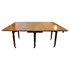 Early 19th Century English Double Gated Drop Side Dining Table
