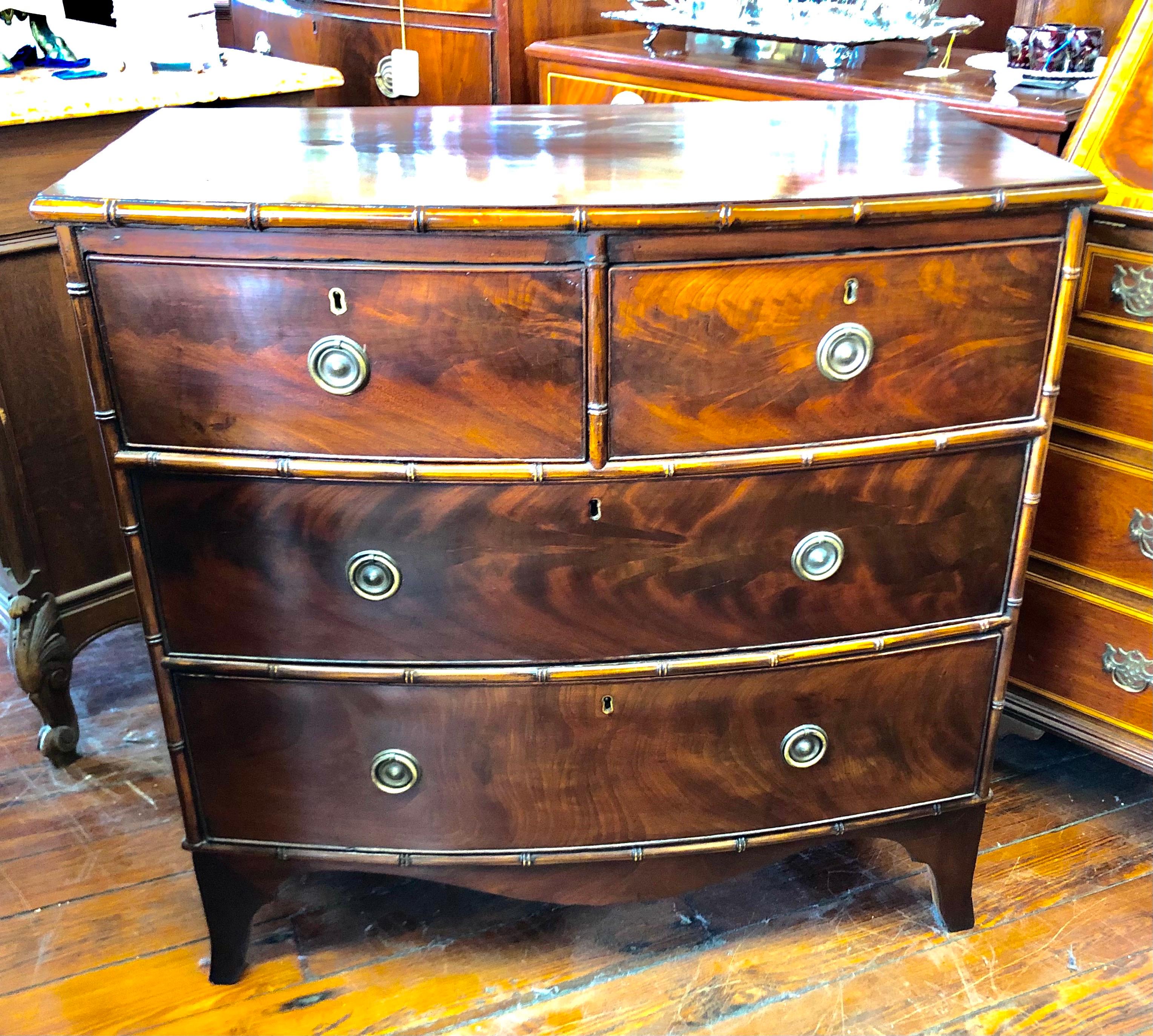 Wonderful antique English early 19th century English flame mahogany Regency style small bowfront Chest of Drawers with 