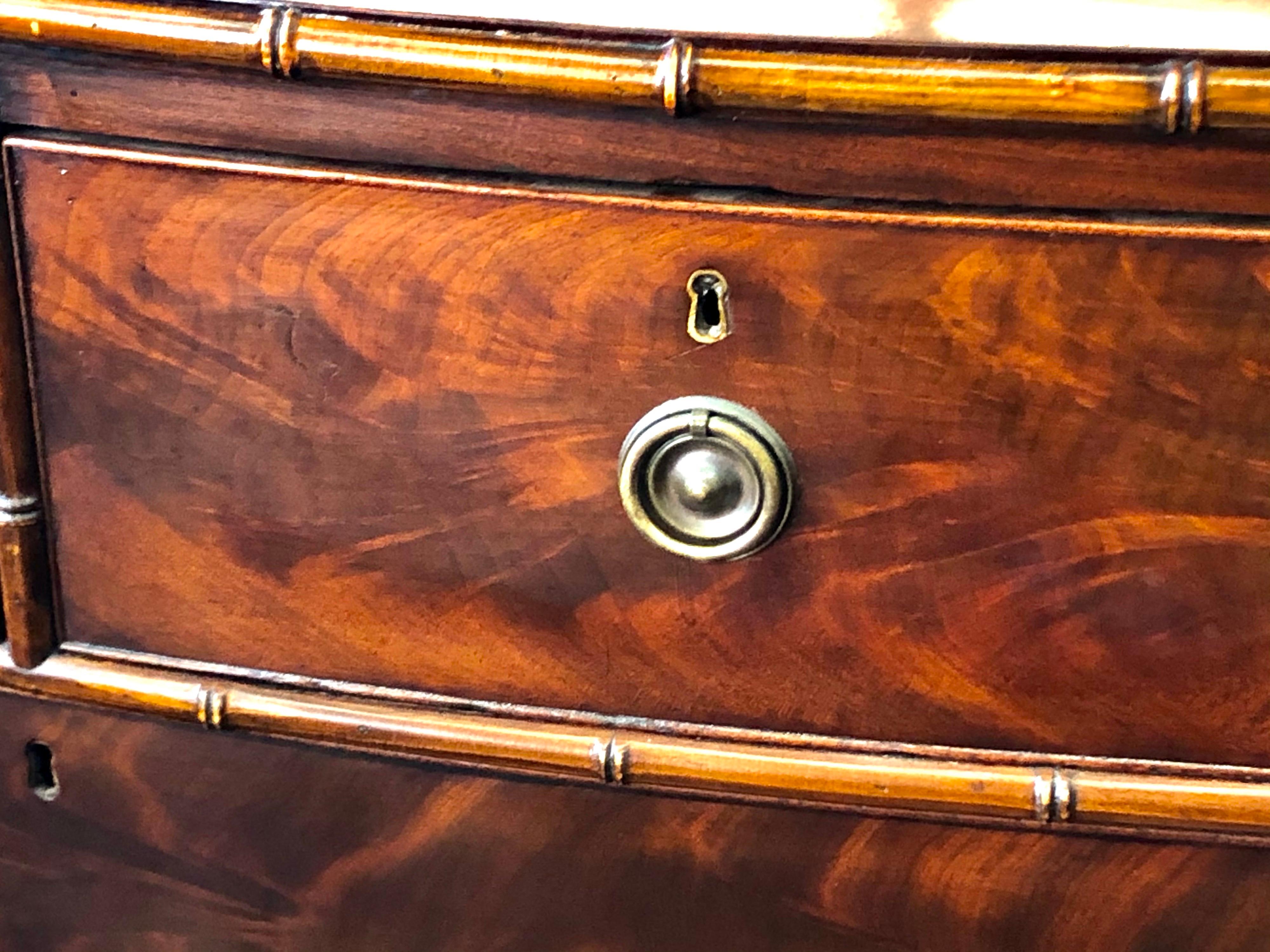 Early 19th Century English Flame Mahogany Faux Bamboo Regency Bowfront Chest In Good Condition In Charleston, SC