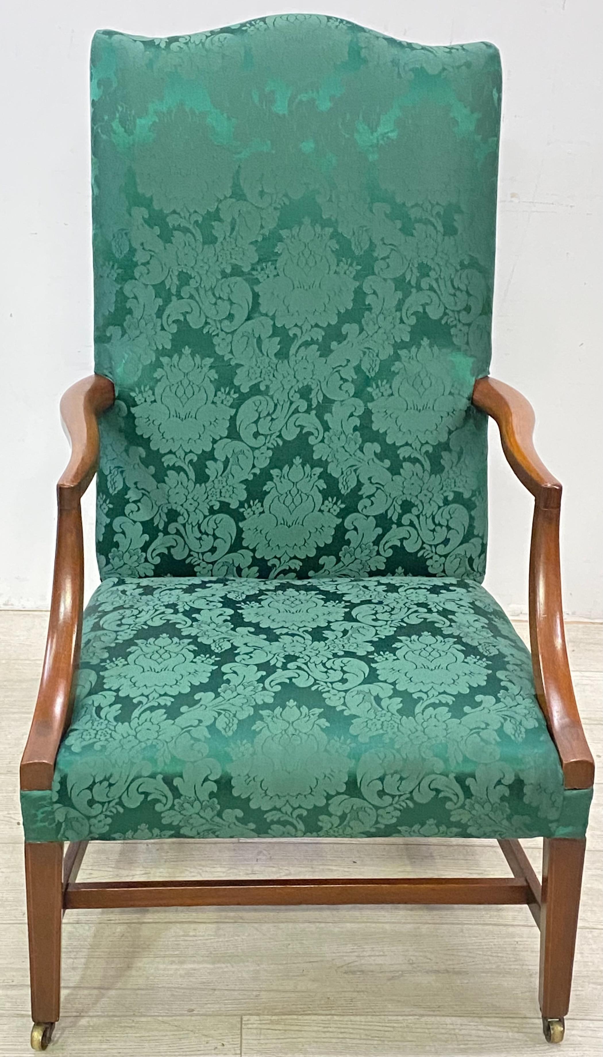 Traditional English George III period mahogany library armchair. Recently upholstered. Having its original finish and original brass casters.
In remarkable antique condition. Sturdy and sound.
England, early 19th century, circa 1810.


 