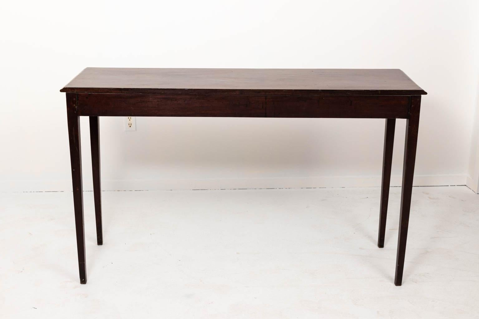 English Georgian mahogany console table with plain tapered legs, circa early 19th century. Please note of wear consistent with age including minor chips.