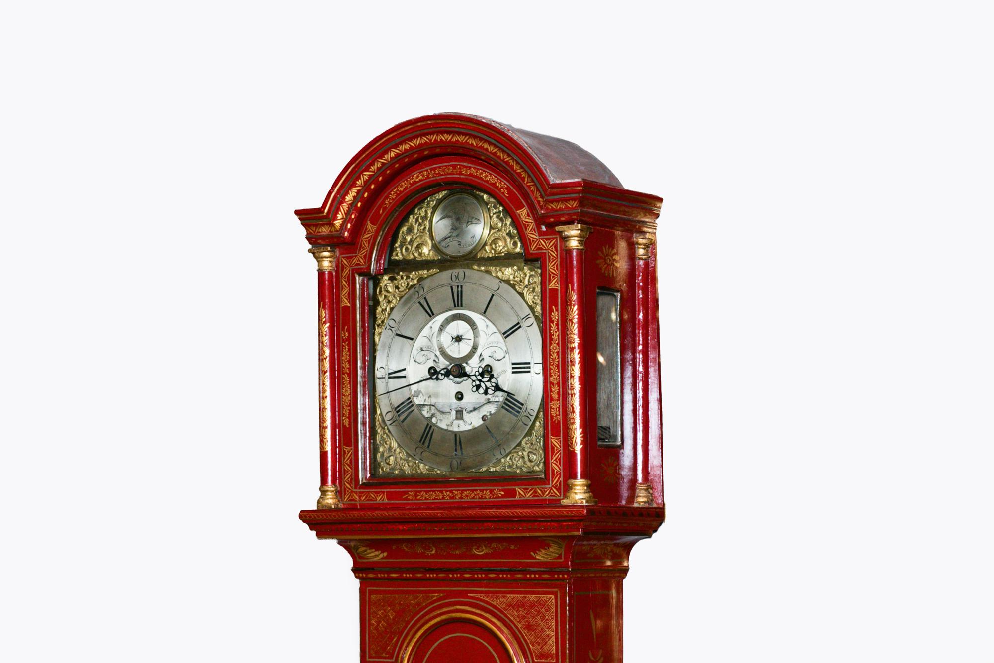 Early 19th Century English Japanned grandfather clock by Robert Woollan of Glastonbury, with an engraved silver and brass face and silver chapter ring. Boasting an intricate hand painted Japanned case with gilt Chinoiserie pagoda, figural and
