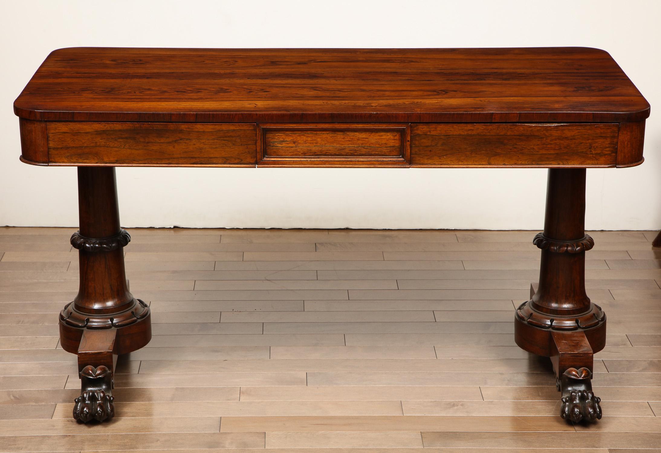 Early 19th century English library table with two drawers in Goncalo Alves.