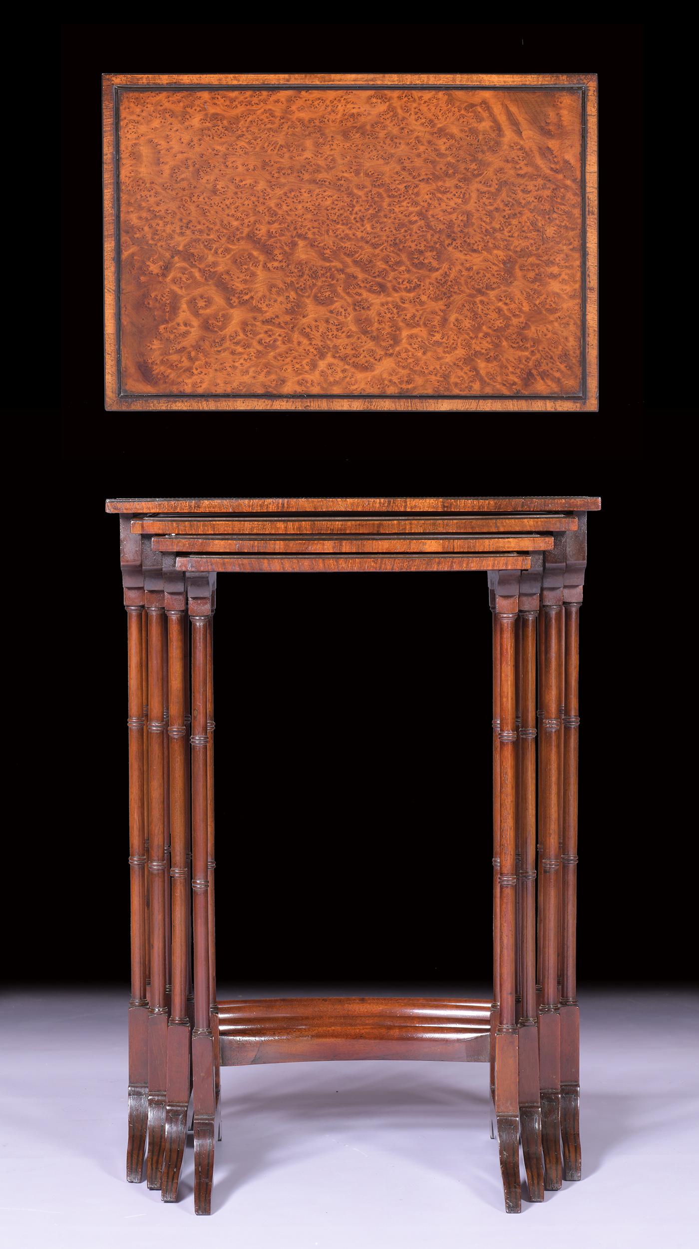 A very fine and attractive nest of tables constructed in Amboyna wood, of graduated rectangular size, on ring turned columns raised on tressel end supports joined by stretcher.

Circa 1828

English