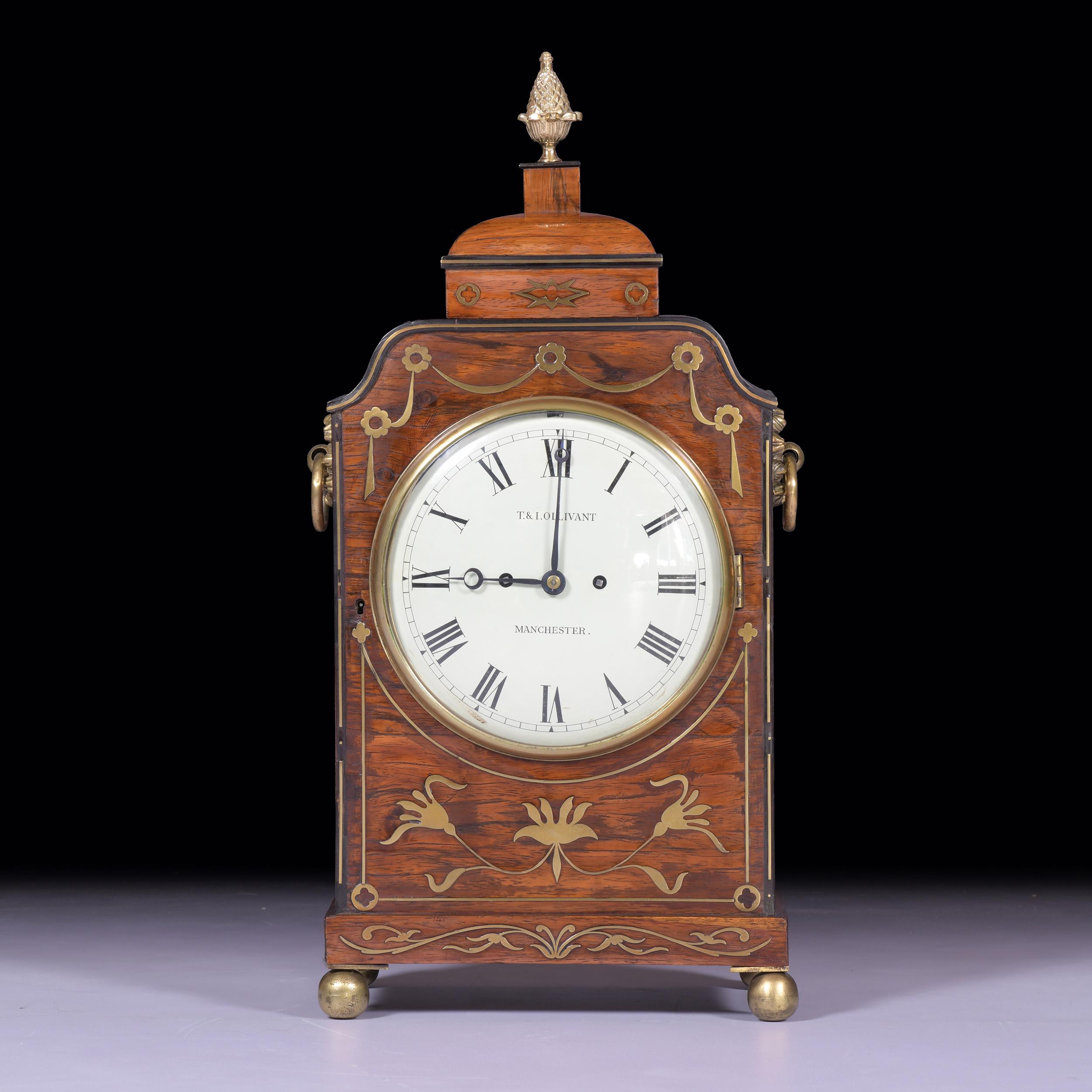 A very fine English regency period bracket clock with rosewood case, surmounted by a pineapple finial on a bell shaped caddy over a double steeped plinth . Substantial 8 Day twin fusee movement striking the hours on original bell. The 8? painted