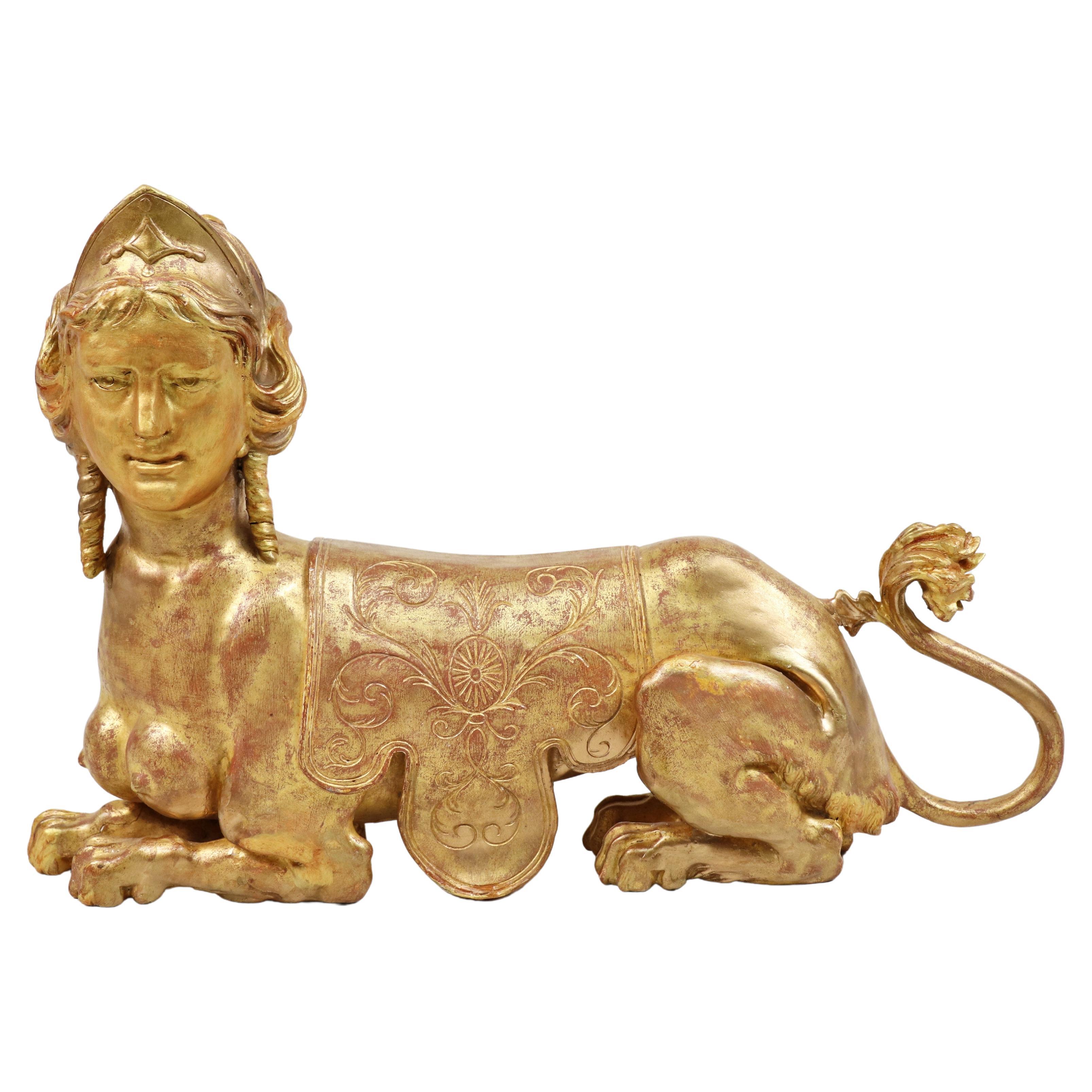 Early 19th Century English Regency Greek Revival Gilt Carving of a Sphinx For Sale