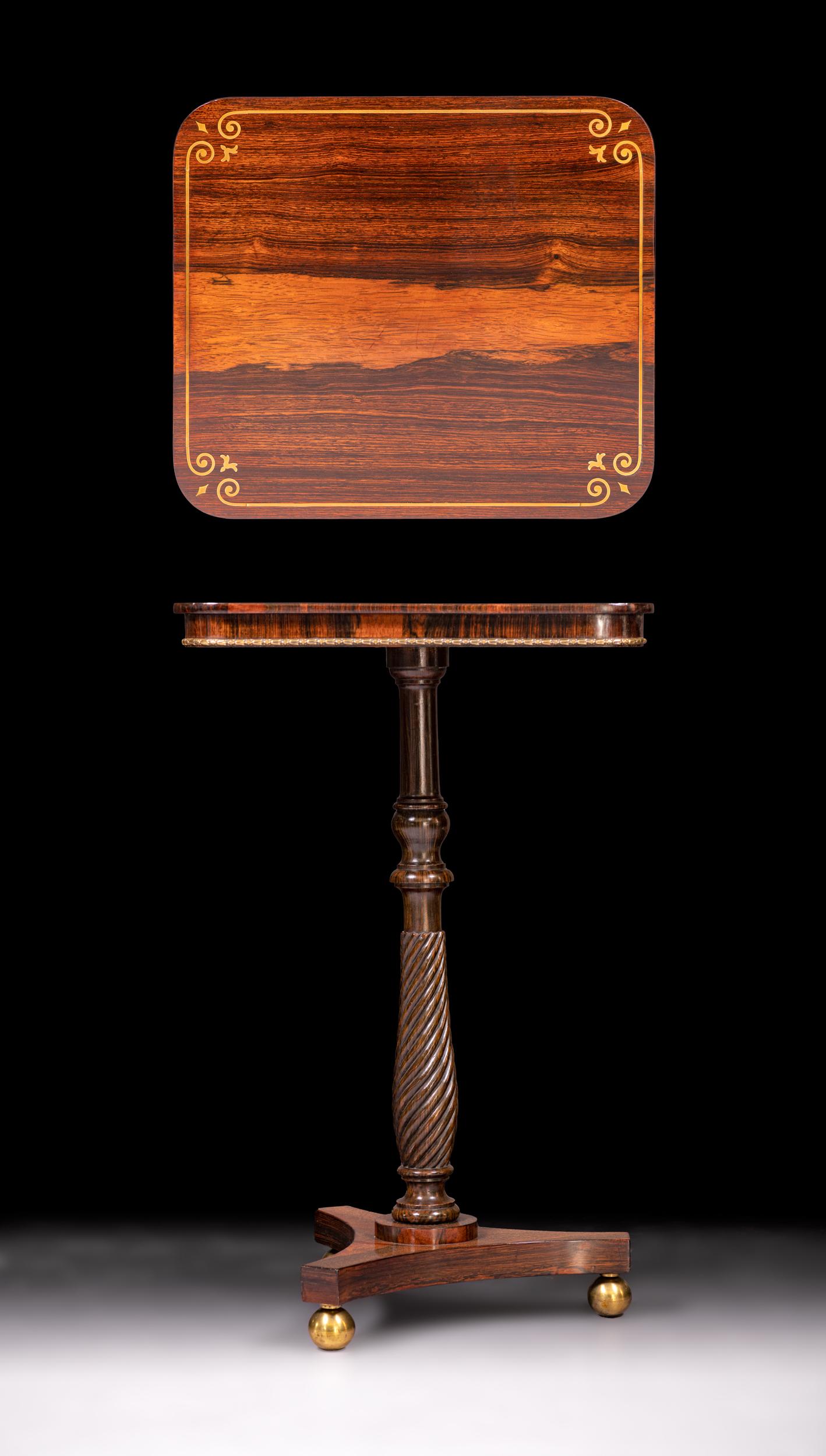 A Regency occasional table in goncalo alves, attributed to Marsh and Tatham, inlayed with decorative brass to the top and sides.

Circa 1820

English

Marsh & Tatham were celebrated as ‘Upholders’ to George, Prince of Wales (later George IV)