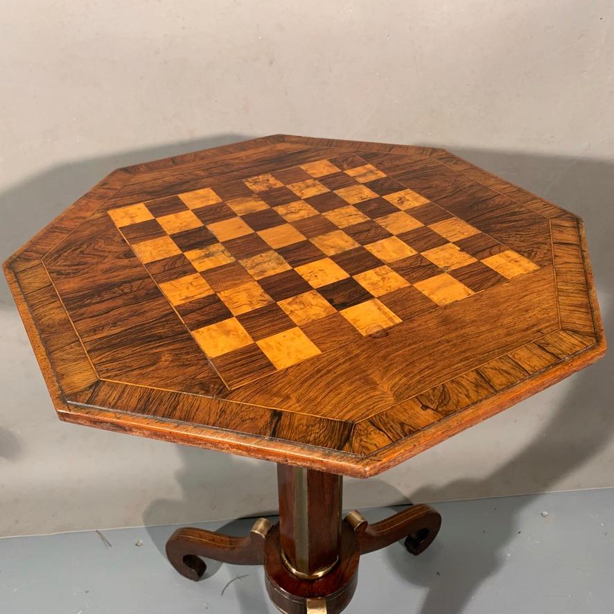 An outstanding and very original early 19th century English Regency period rosewood and brass inlaid octagonal top games tripod table.
This is one of the most beautiful tables I have seen of this style and of the best quality, really is a thing of