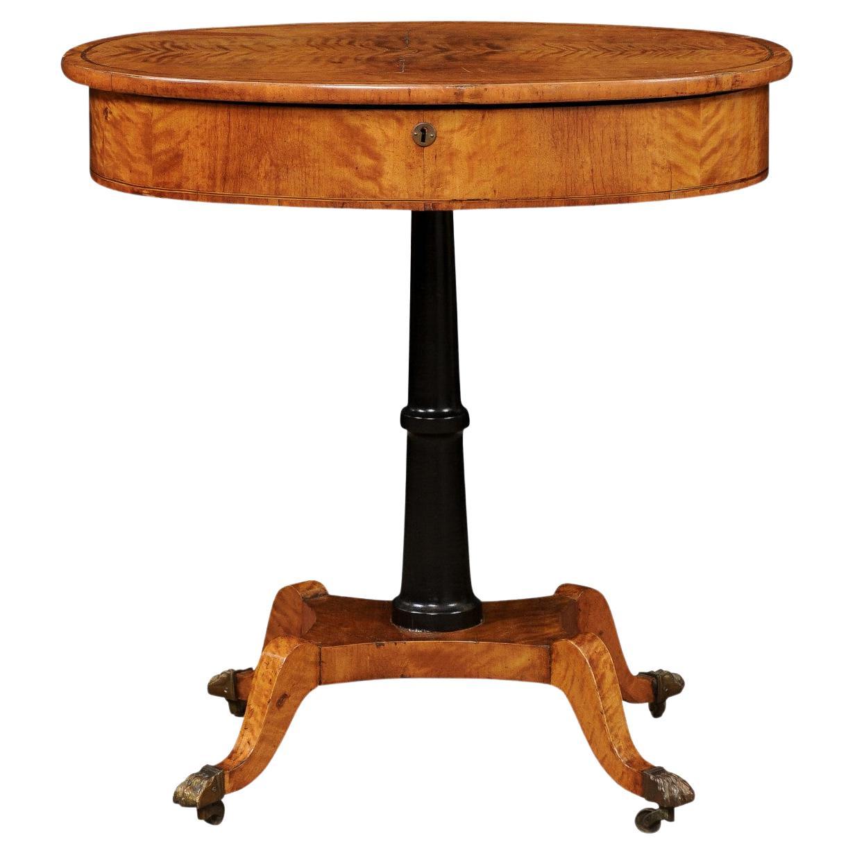 Early 19th Century English Regency Satinwood & Ebonized Oval Work Table For Sale