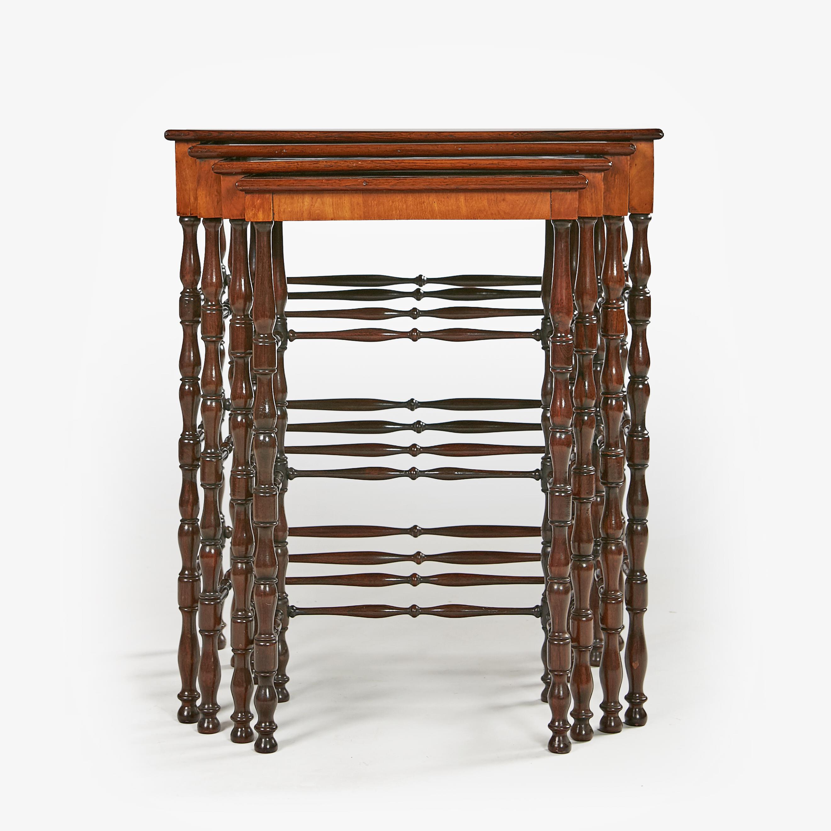 set of Regency amboyna, thuya, maple and rosewood banded quartetto tables
attributed to Gillows, with rectangular tops, the smallest with chequerboard, on baluster turned legs joined by stretchers.

Circa 1820

English

Footenote:

A