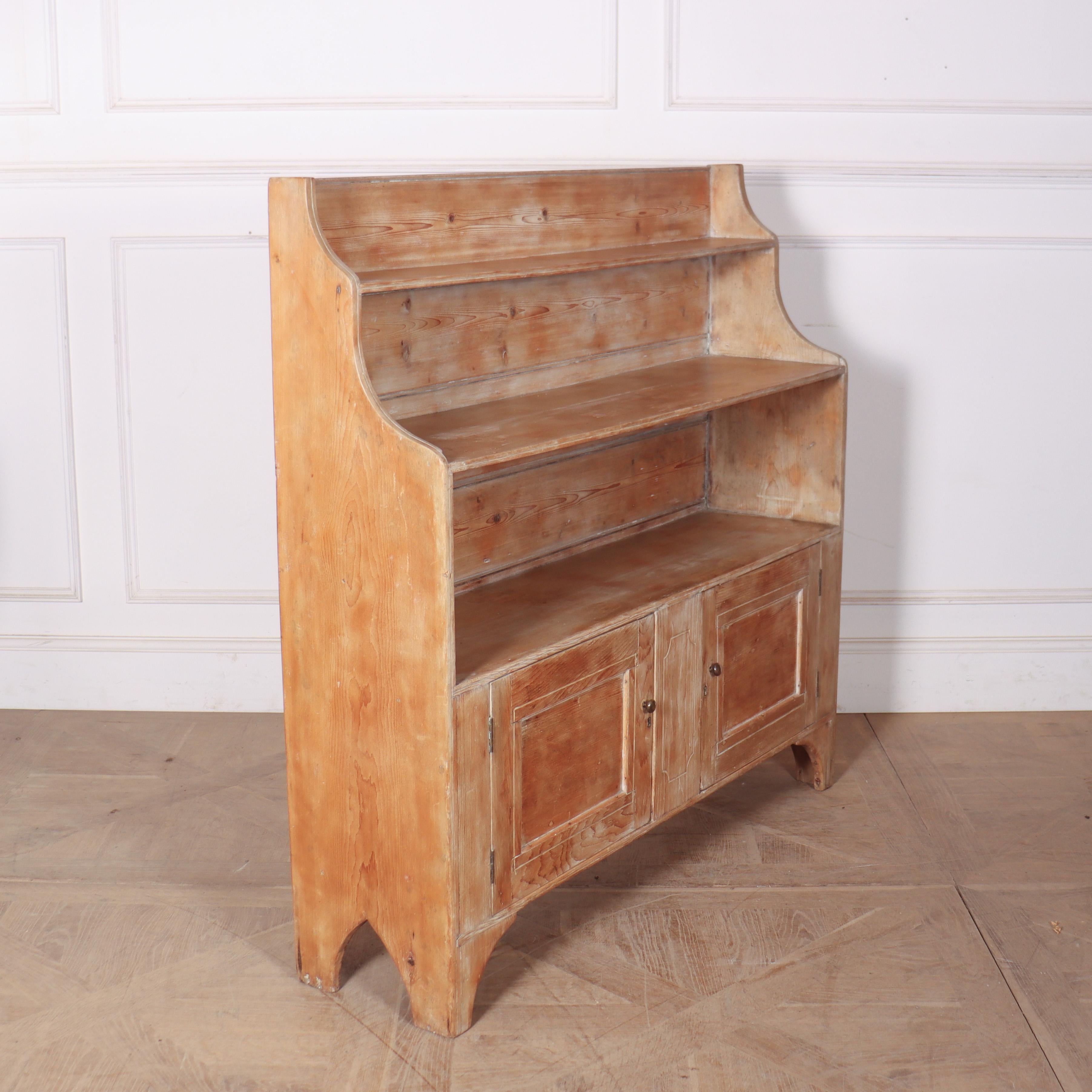 Early 19th century English pine regency waterfall bookcase. 1810.

Top shelf depth: 5.5-inches (14cm).

Code: 8756

Dimensions:
W: 48