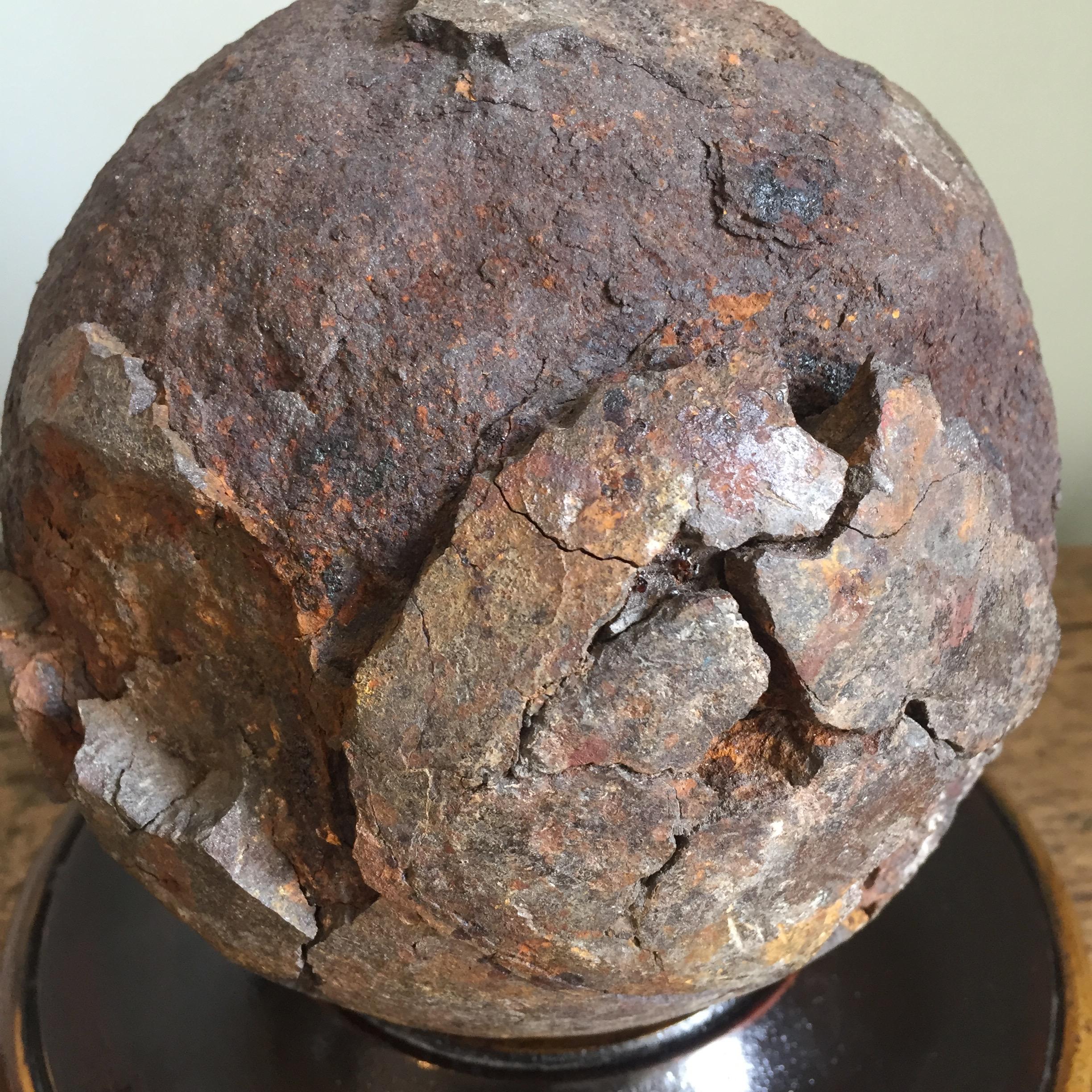 Cast Early 19th Century English Relic Cannonball on a Turned Wooden Base For Sale