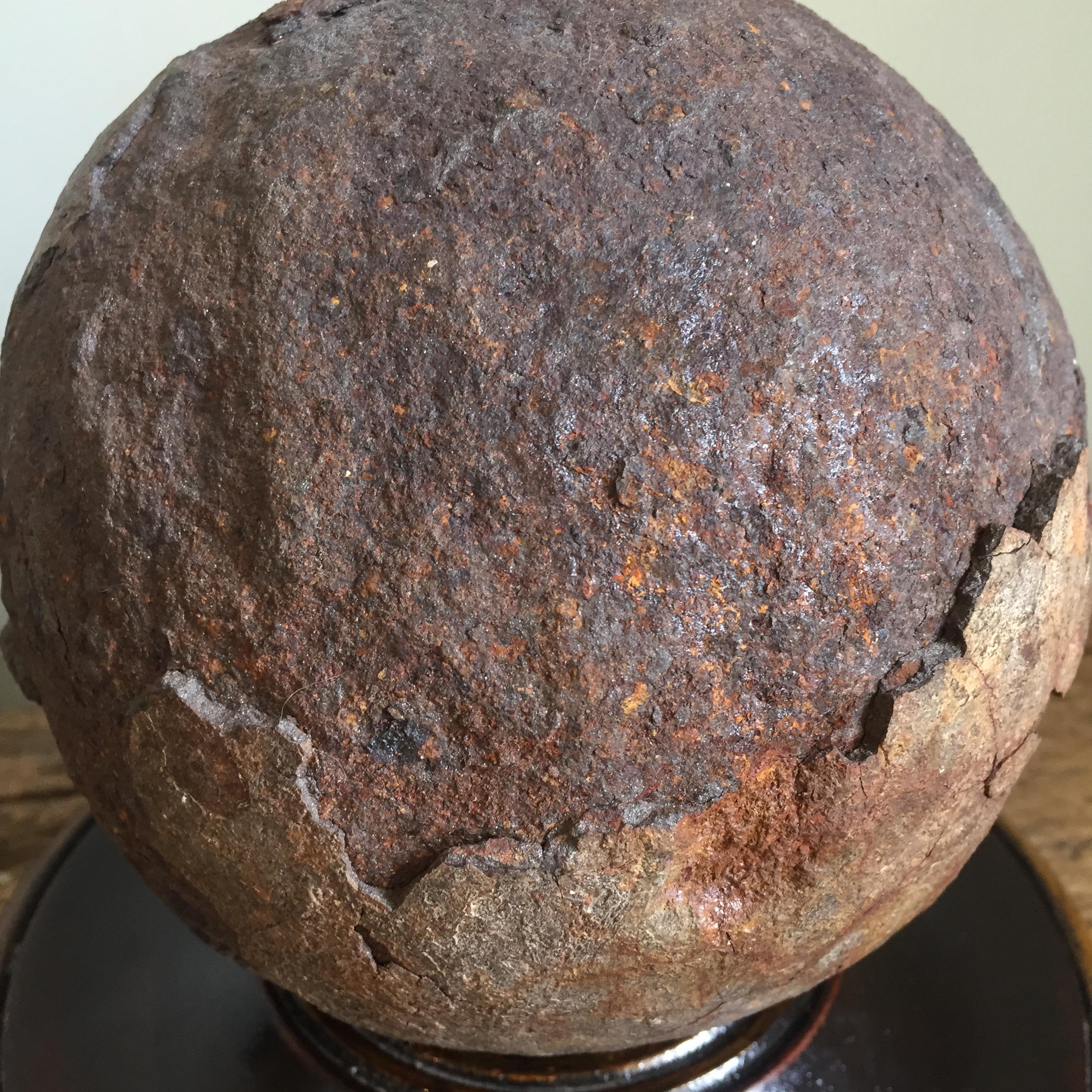 Early 19th Century English Relic Cannonball on a Turned Wooden Base In Distressed Condition For Sale In Tetbury, GB