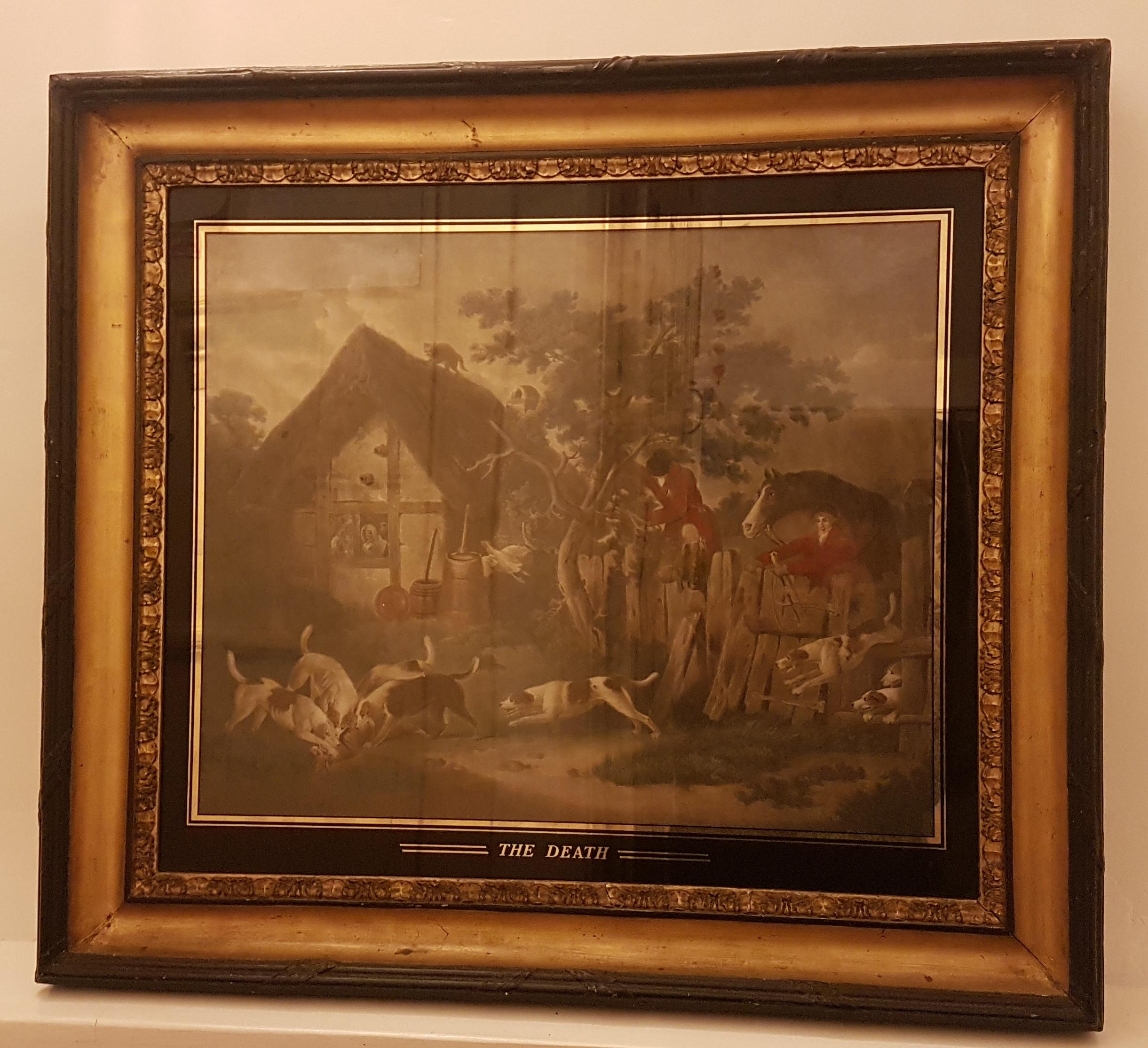 A large early 19th century English School hand colored print of a fox hunting scene titled 'The Death'. The hand colored print is in fair condition and is in what appears to be the original frame that is gilt and ebonised with the églomisé glass