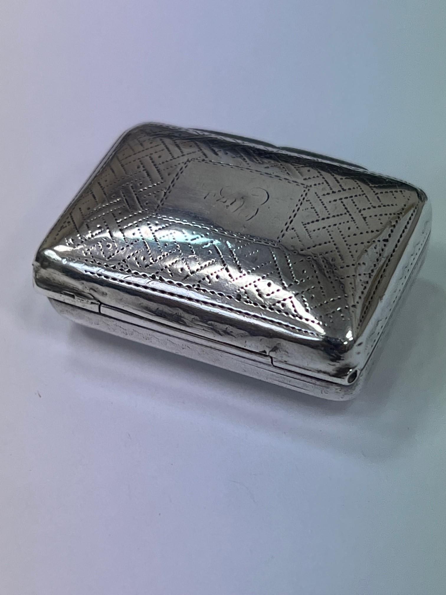 Early 19th century sterling silver puffed pillow like vinaigrette by Thomas Shaw Birmingham England Silvermaker. Thomas Shaw renowned maker of vinaigrettes and snuff boxes worked in Birmingham England between 1818 and 1845. Vinaigrette jewelry was