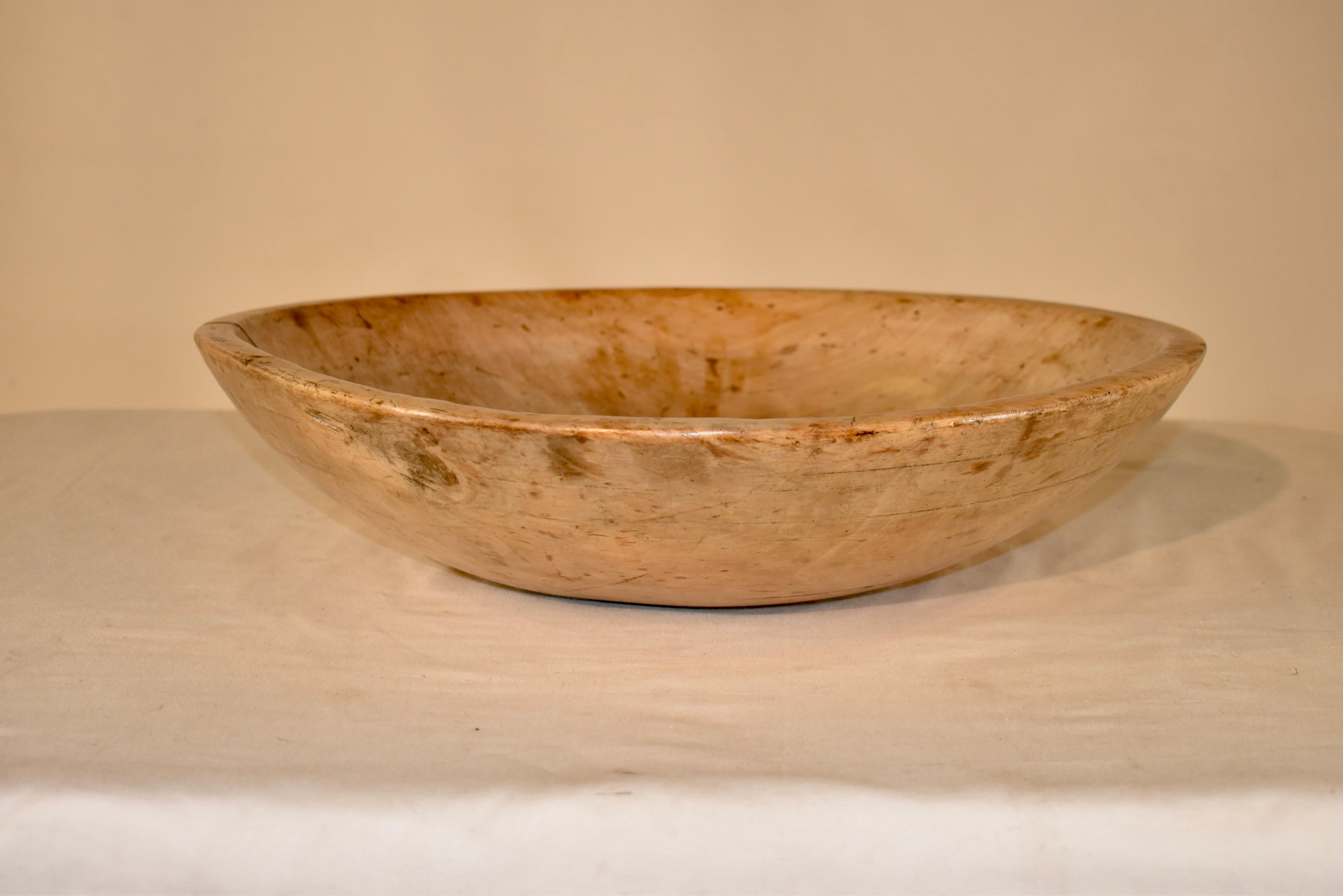 Gorgeous hand turned sycamore bowl from England.  The wood is in its natural color and has appropriate wear for age and use.  These bowls were heavily used on farms and dairies for gathering milk or vegetables and also used for serving.  This wold