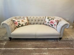 Early 19th Century English Upholstered Button Back Scrolled Arm Chesterfield