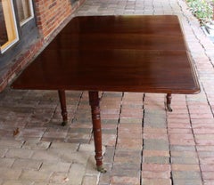Early 19th Century English Drop-Side Dining Table