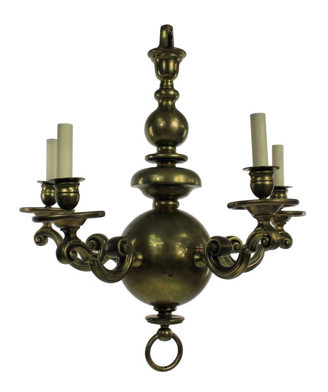 A Flemish chandelier in brass of unusual form. In solid brass and consisting of five arms.
Newly electrified.
