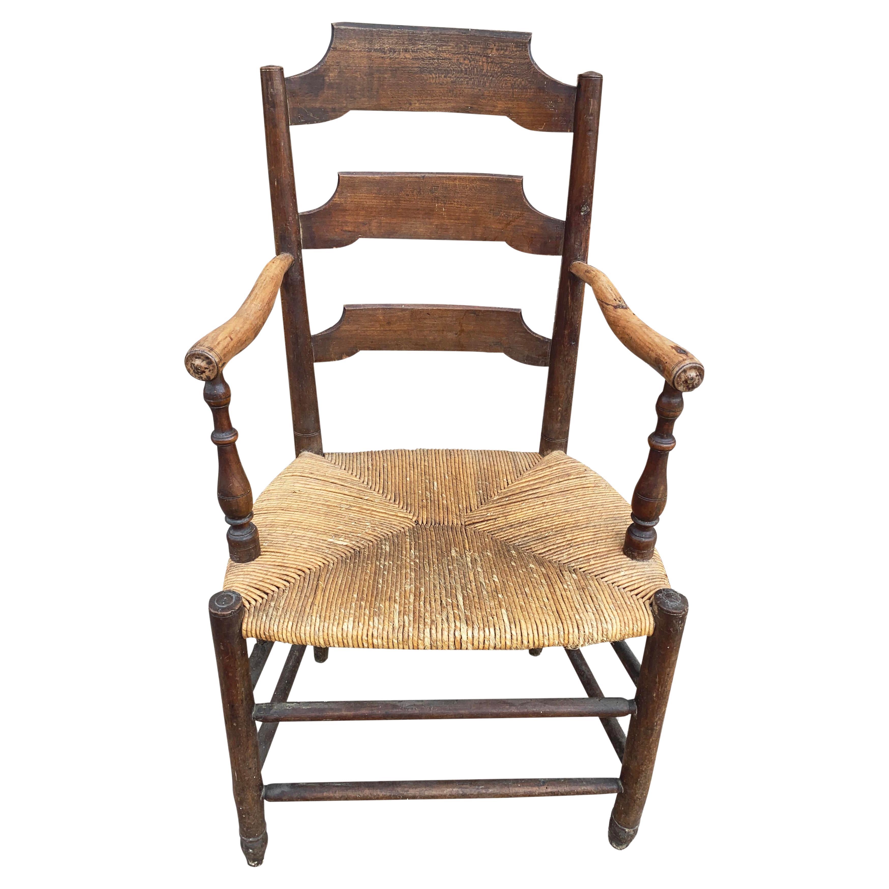 Early 19th Century French Ash Wood Rush Seat Armchair For Sale