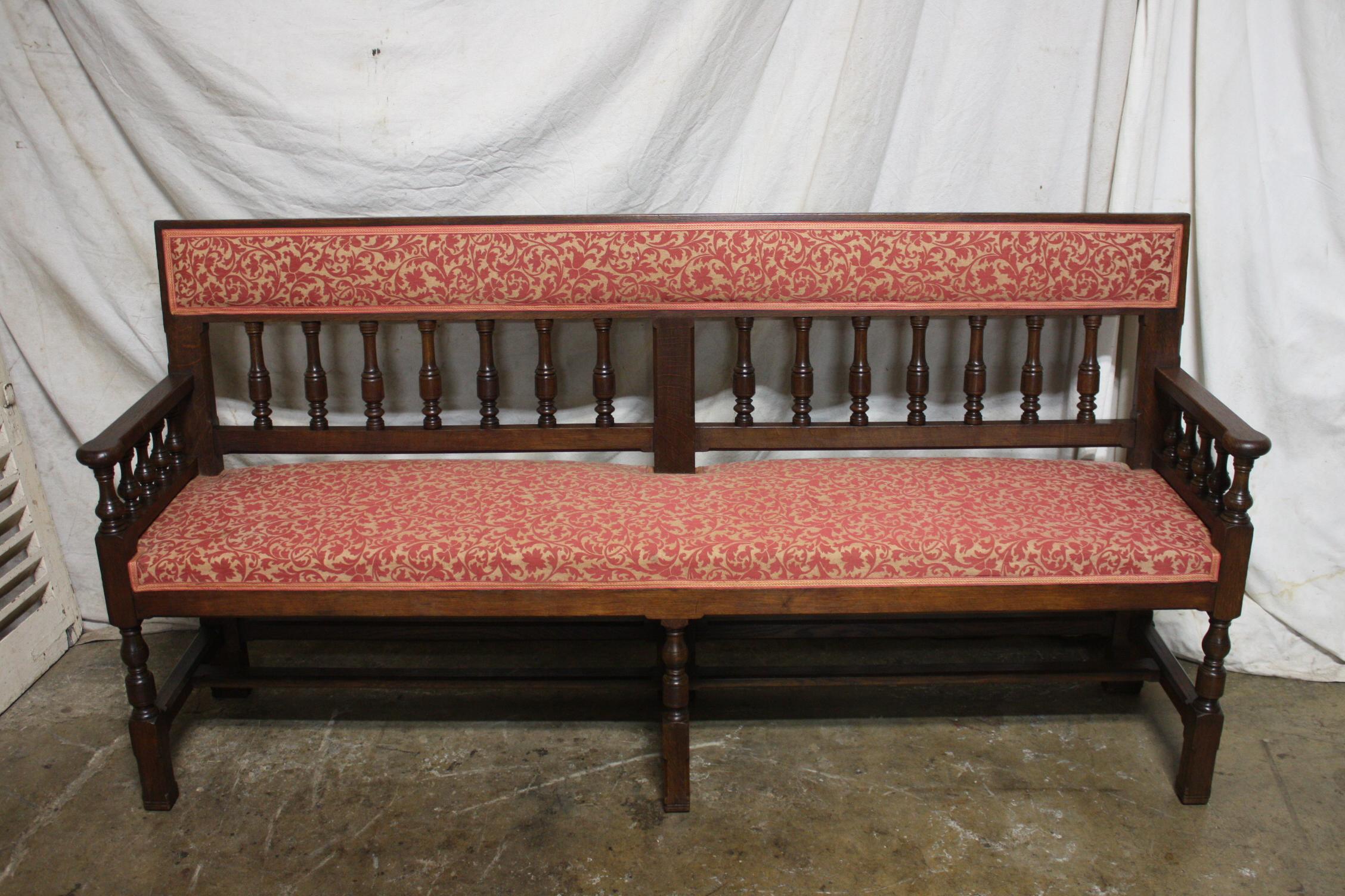 Very nice old bench with an old fabric and in a good condition. Narrow it can be place anywhere in a house or on a porch.