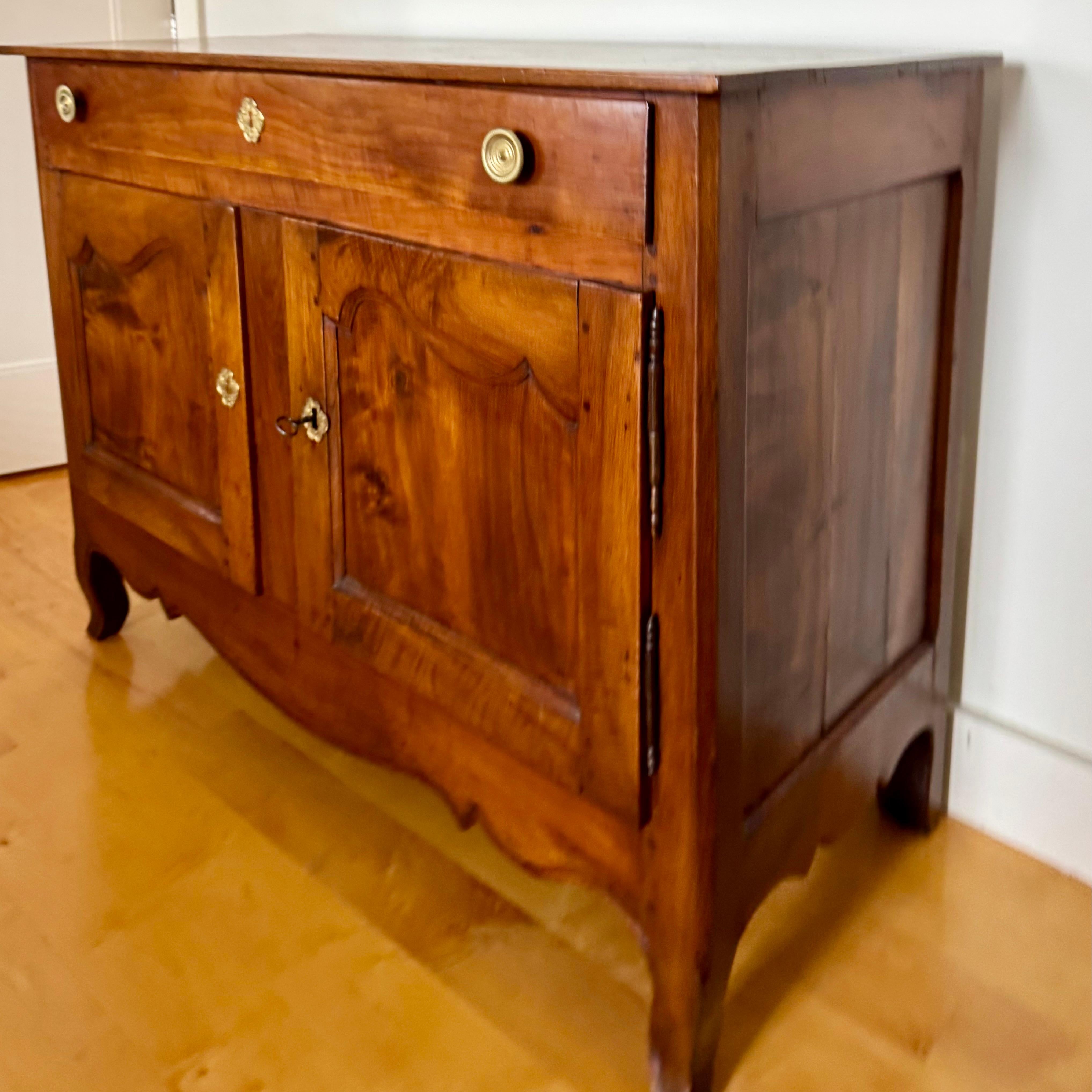 Hand-Carved Early 19th century French Carved Walnut Buffet For Sale