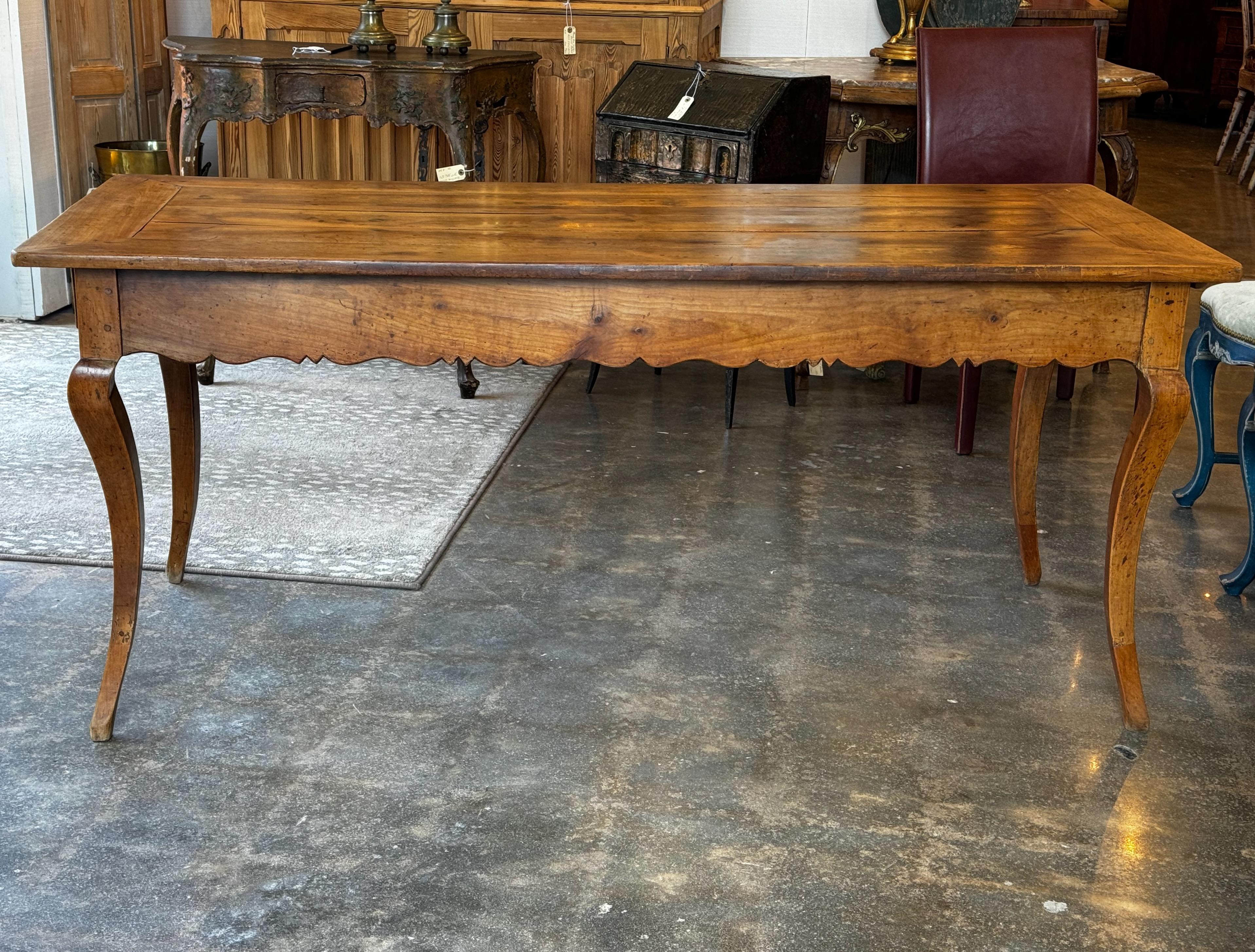 The warm patina and mellow color on this table is the best.. A beautiful table.