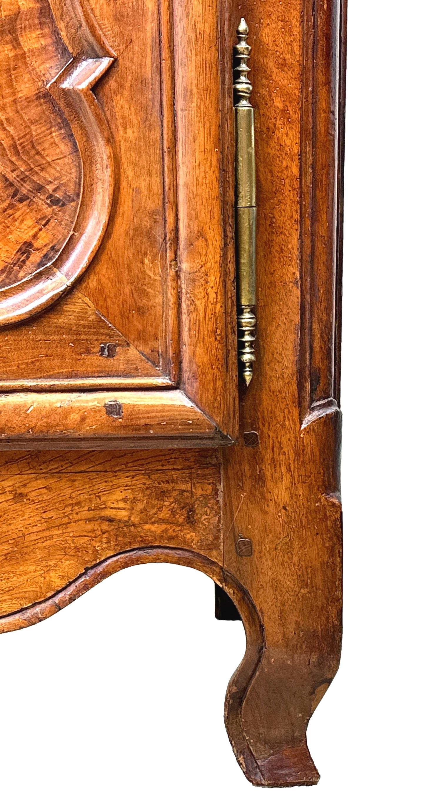A Wonderful Early 19th Century French Provincial Cherry Wood Dresser, Or Cupboard, Having Well Figured Top With Cleated Ends, Over Three Frieze Drawers With Replacement Brass Handles And Attractive Moulded Panelled Doors, With Exceptional Figuring,