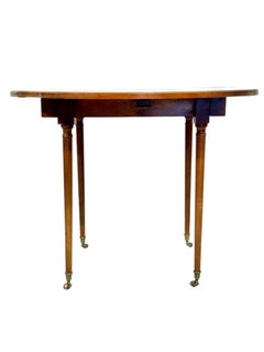 Early 19th Century French Cherrywood Drop-Leaf Table on Gilt Bronze Casters