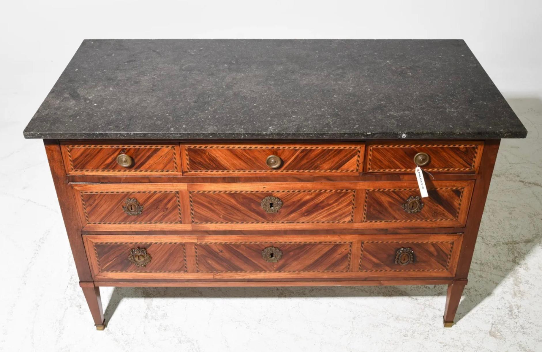 French commode from the 19th century. Mahogany with three drawers with bronze circular hardware and brass escutcheons. Gray and black marble top.