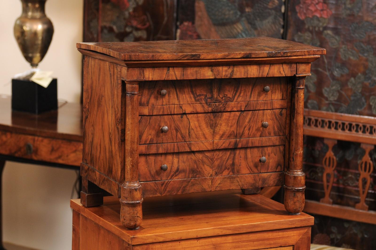 Early 19th century French Empire Apprentice Commode in walnut with lift top. Table top item.