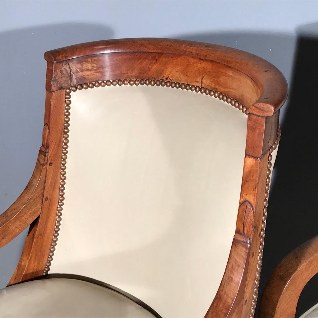 Mid-19th Century Early 19th Century French Empire Barrel Back Armchairs in Walnut with Leather