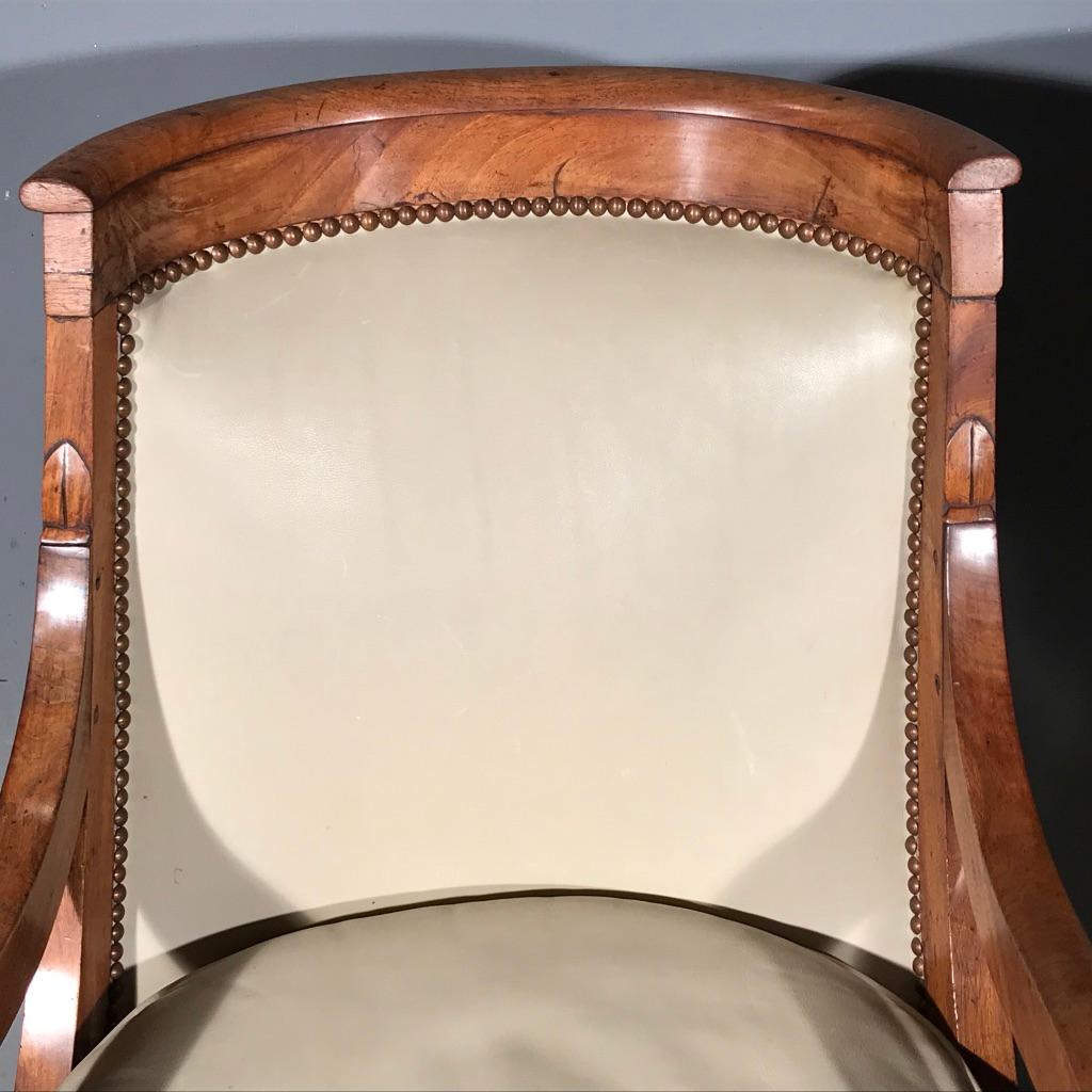 Early 19th Century French Empire Barrel Back Armchairs in Walnut with Leather 2