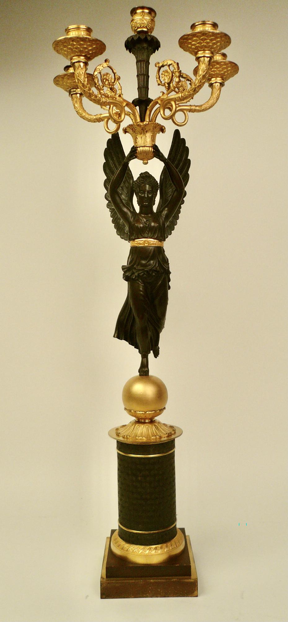 Patinated Early 19th Century French Empire Bronze NIKE Figural Candelabra For Sale