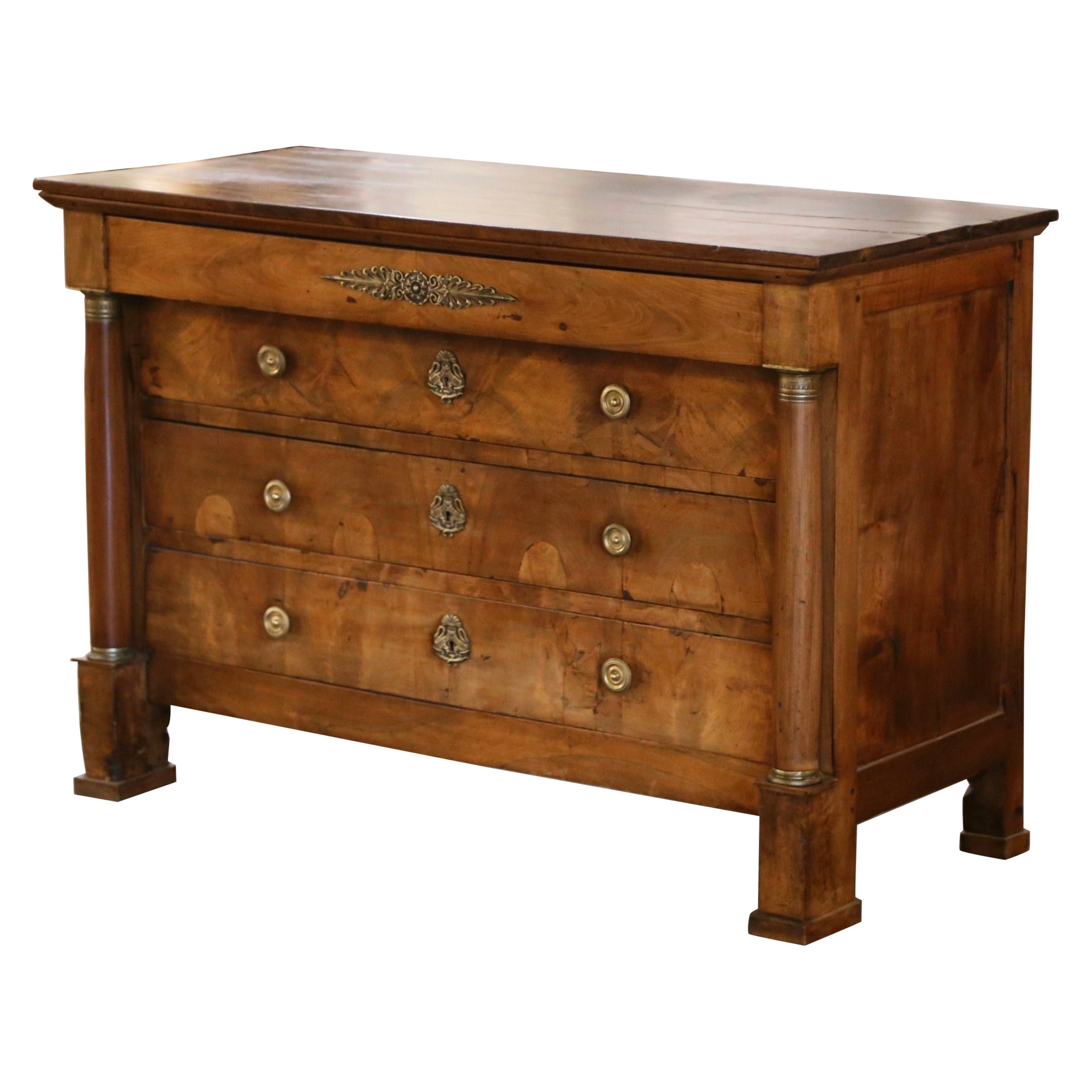 Early 19th Century French Empire Carved Walnut Four-Drawer Commode