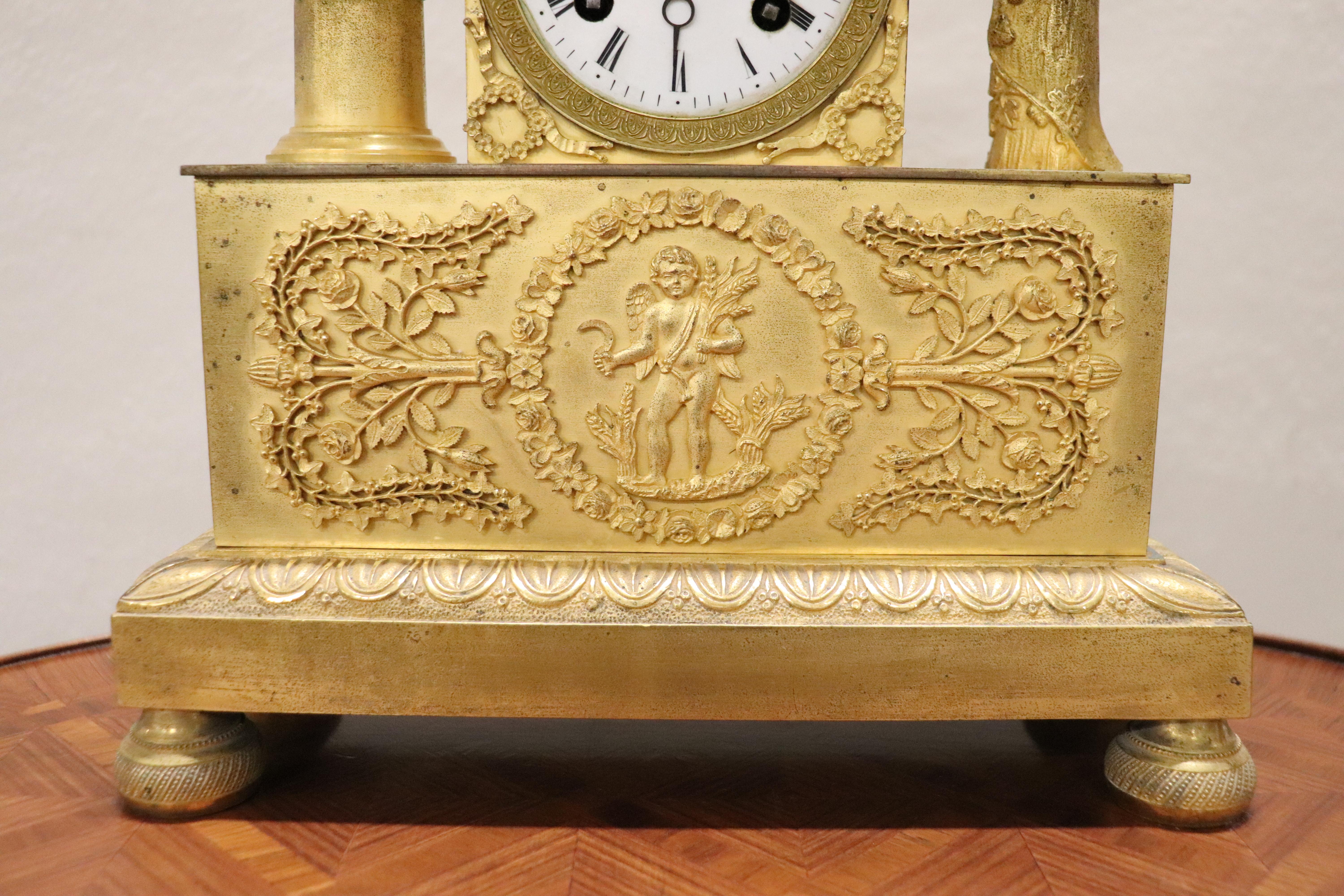 Early 19th Century French Empire Fine Gilt Bronze Mantle Clock with Cupid 4