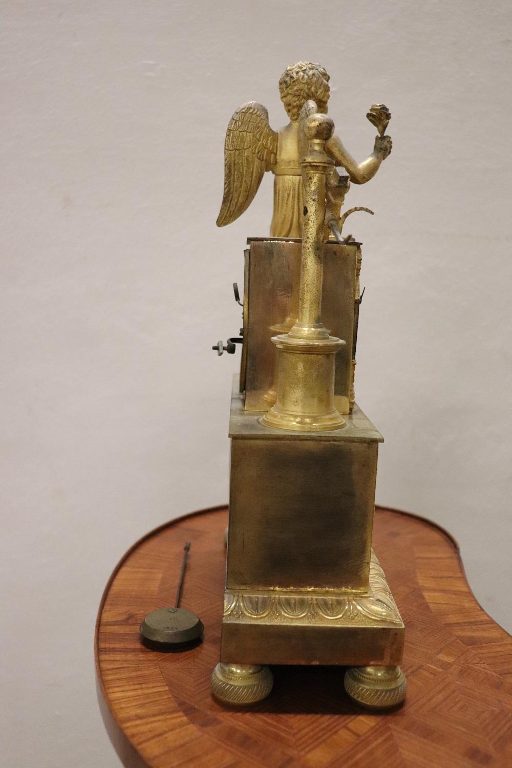 Early 19th Century French Empire Fine Gilt Bronze Mantle Clock with Cupid 5