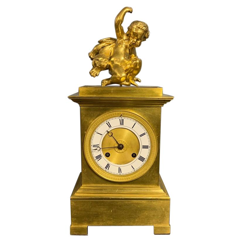 Early 19th Century French Empire Gilt Bronze 8 Day Mantle Clock For Sale