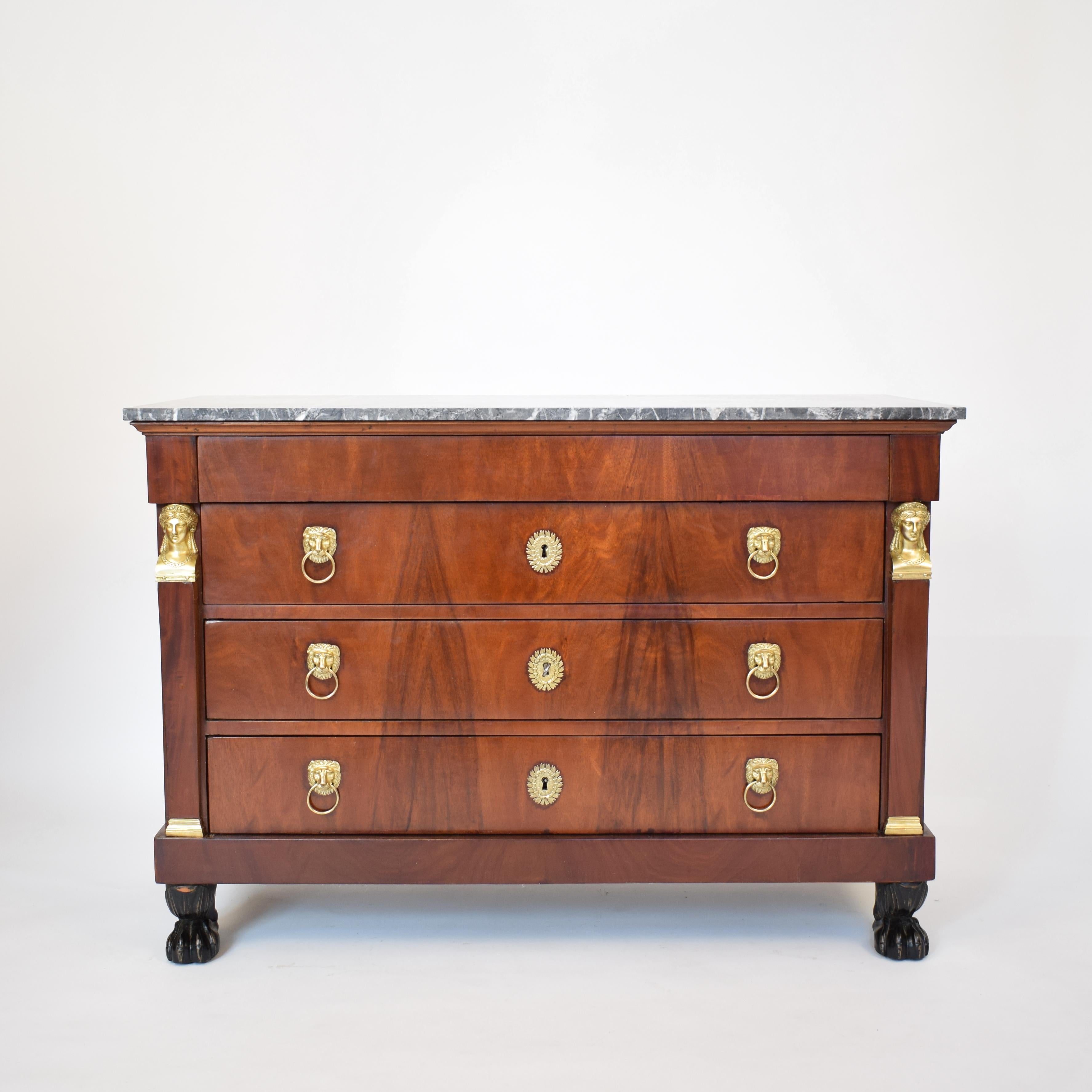 This fine and early 19th century French Empire ormolu-mounted mahogany commode was made circa 1802 in France, probably in Paris.
The brass fittings are from a very high quality and the whole piece is in a very good restored condition.
It still has
