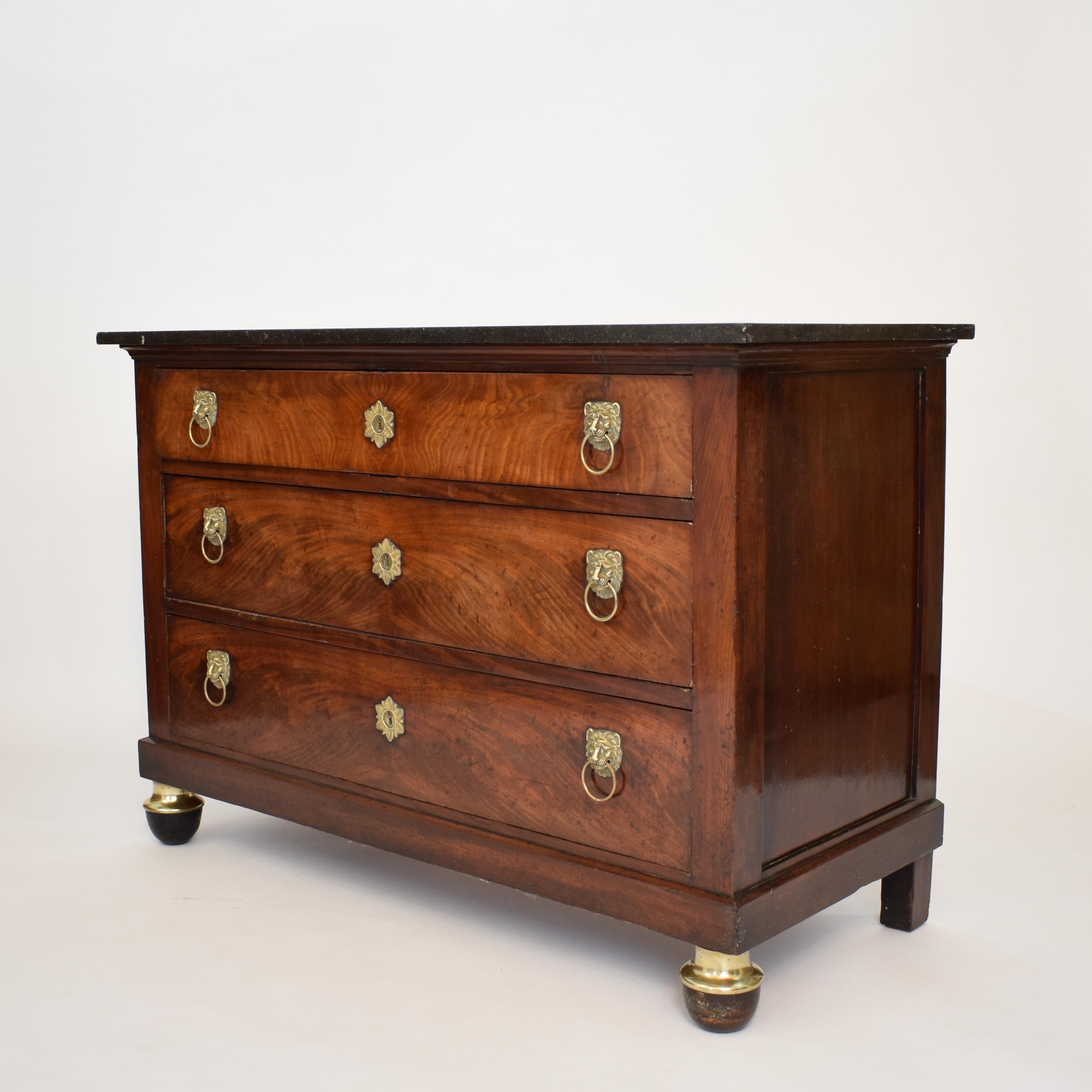 This beautiful 19th century French Empire commode was made in 1800.
 It is mahogany on oak with the original fittings and the original marble-top. The keys are missing. It is in a very good original condition.